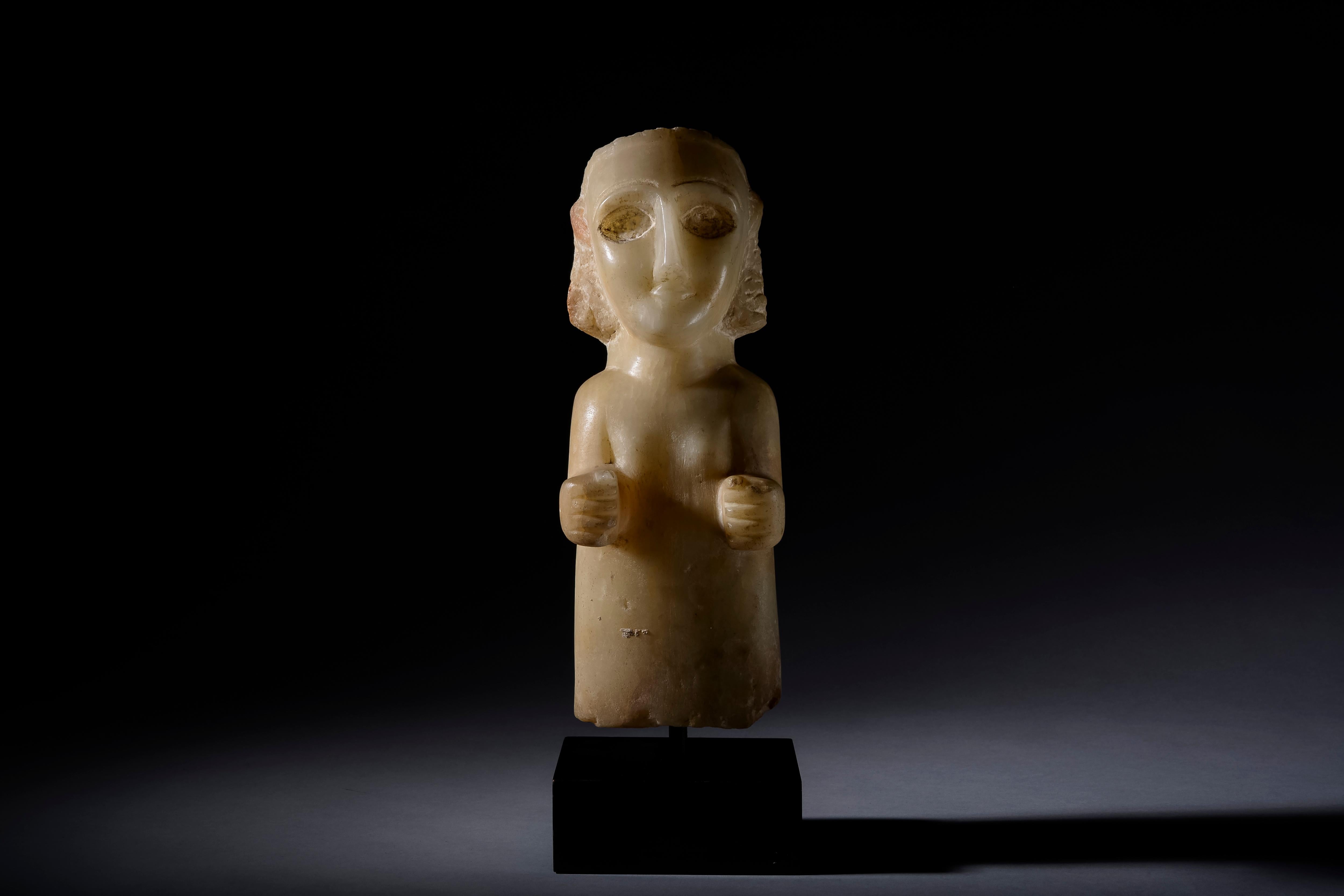 South Arabian Calcite female figure
3rd Century BC to 1st century A.D.
Calcite Alabaster
height: 30.5 cm

A magnificent alabaster female figure, a fine example of the well-studied grace that characterises South Arabian art. The figure is