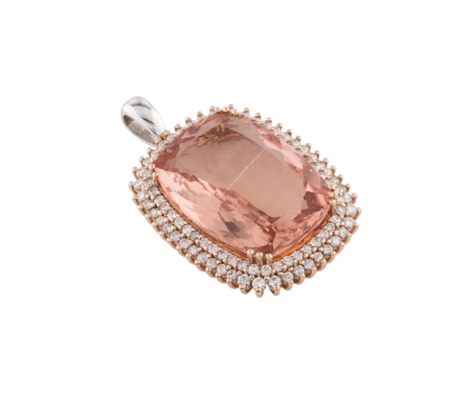 This is a gorgeous and large natural morganite and diamond pendant set in solid 14K rose gold. This well-cut 26X20MM cushion morganite has an excellent peachy pink color (over 35 carats of AAA quality morganite ) and is surrounded by a halo of round
