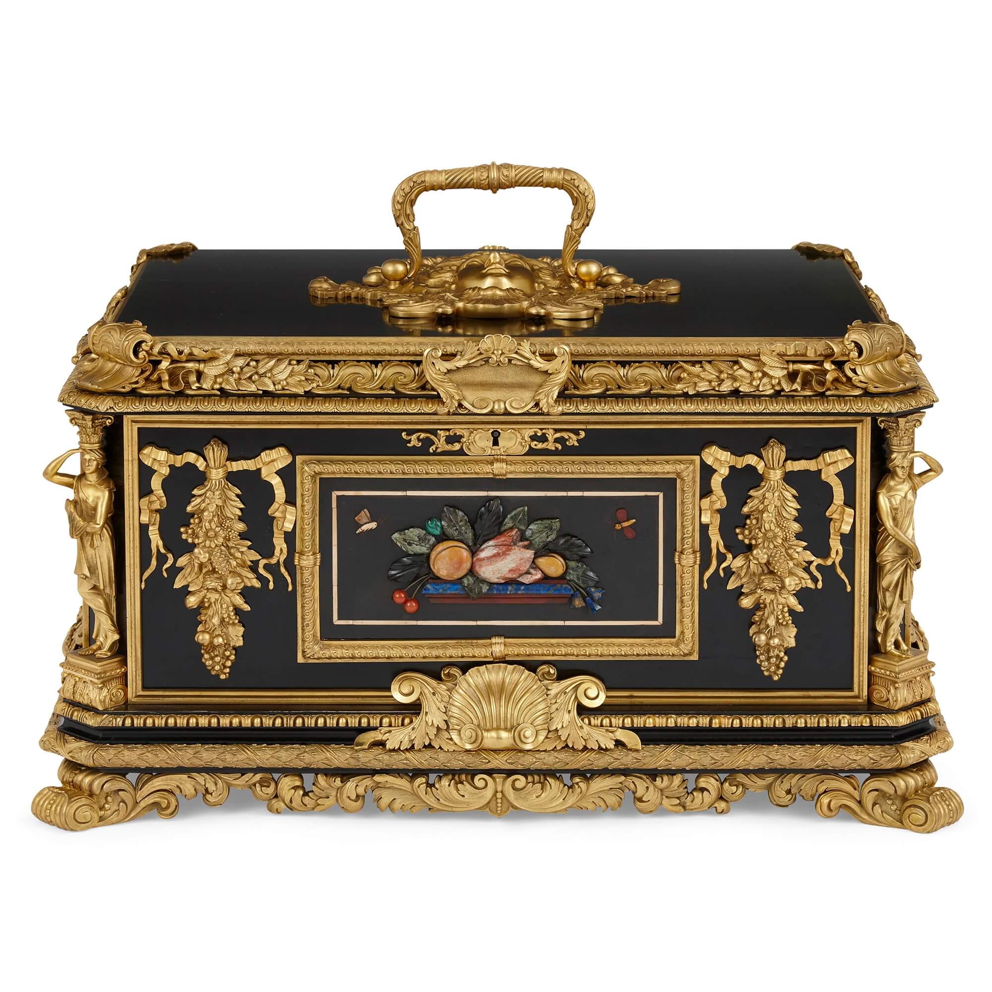Magnificent and large ormolu and hardstone mounted ebonized wooden casket 
English, 19th Century
Height 41cm, width 72cm, depth 52cm

Exceptionally fine and richly adorned, this beautiful piece is a large, ebonized wooden casket or coffer, mounted