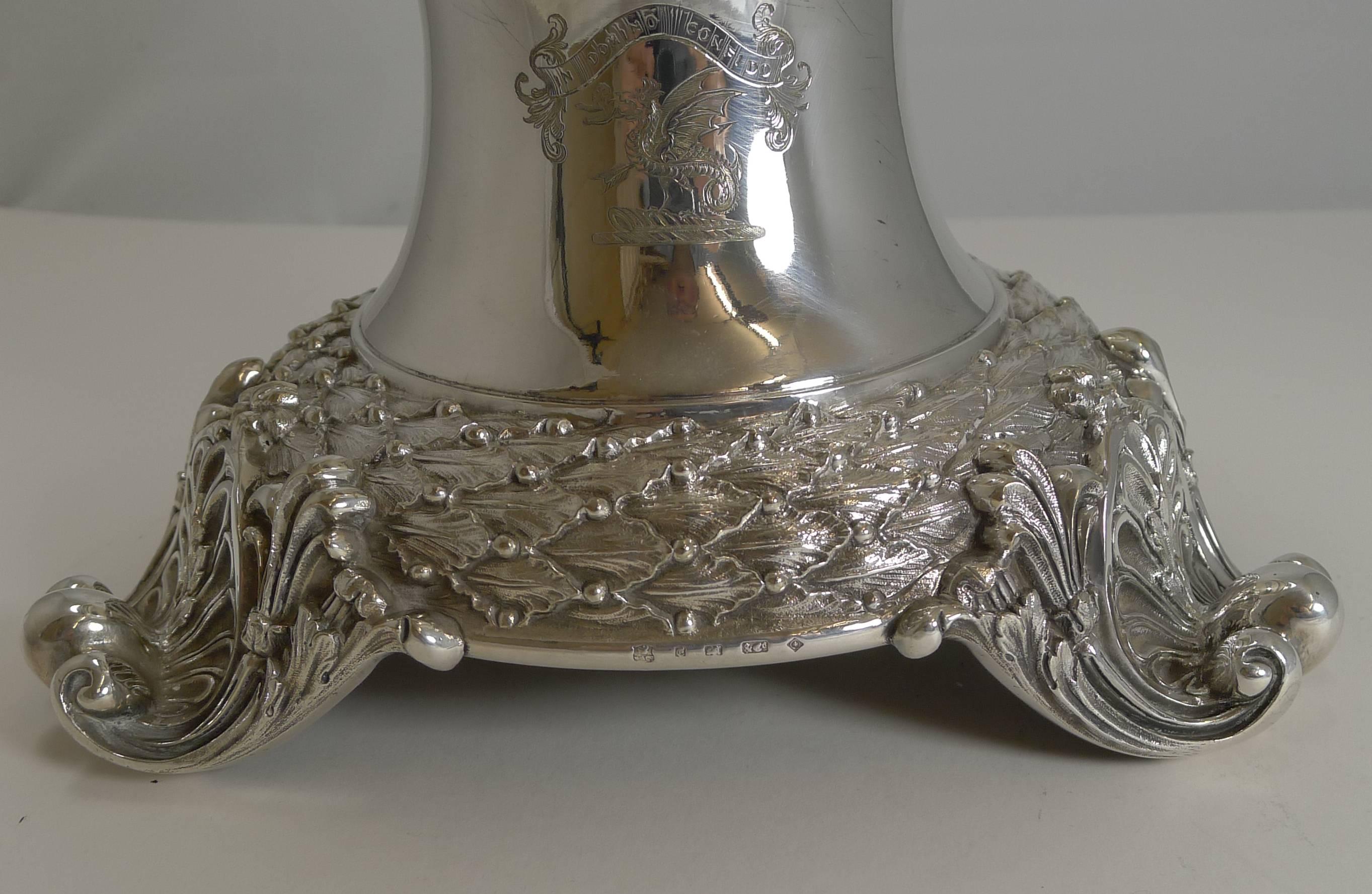 I would imagine this was a regimental presentation gift having had this top quality stand custom made in heavy cast silver plate by the finest of silversmith's Elkington and Co. The stand has a very regal armorial crest engraved to the front. The