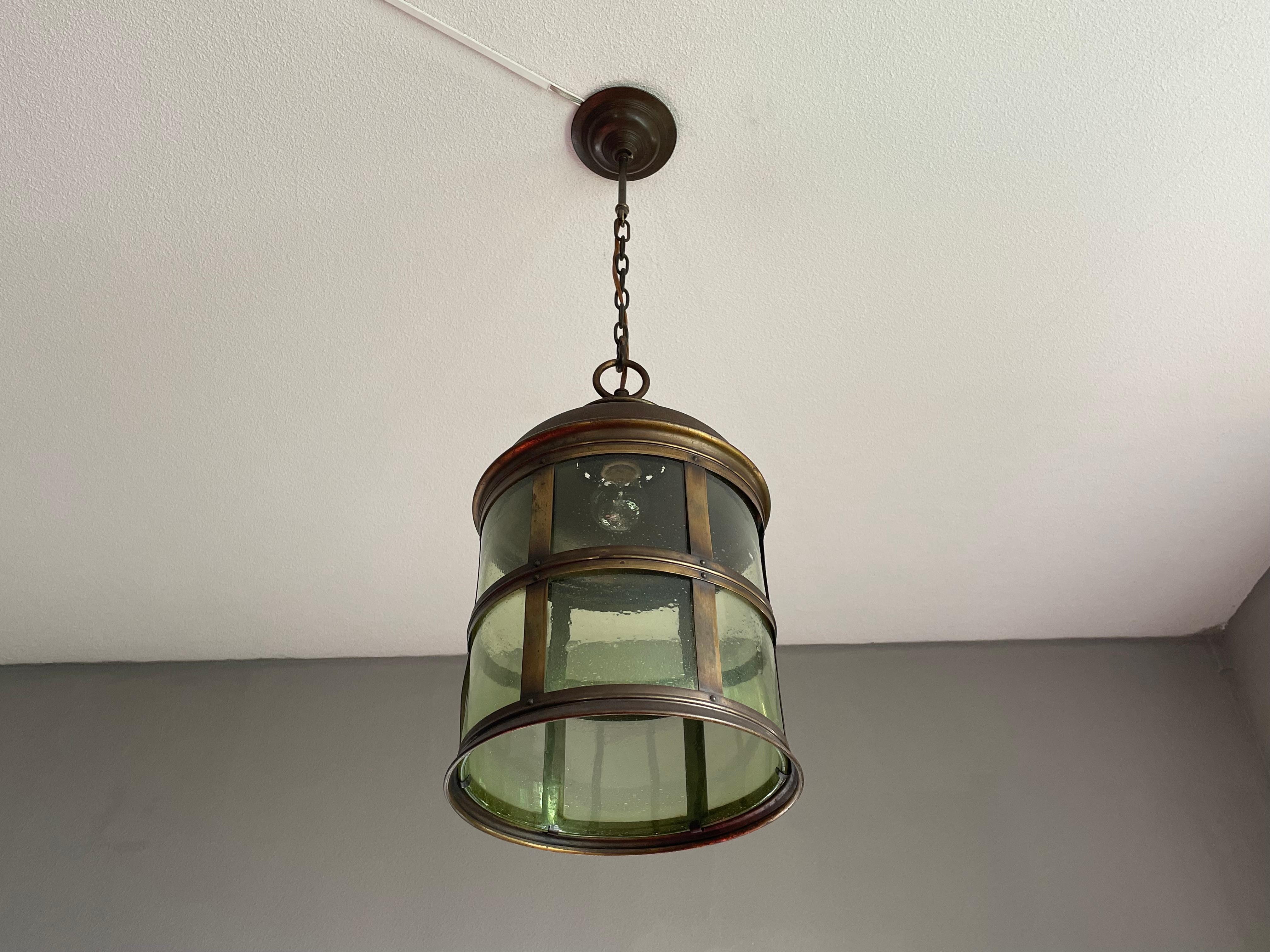 Larger than normal Arts and Crafts hallway pendant with unique art glass.

If you are looking for a stylish and quality crafted antique lantern to grace your entry hall, stairwell or landing then this Arts & Crafts beauty could be perfect for you.