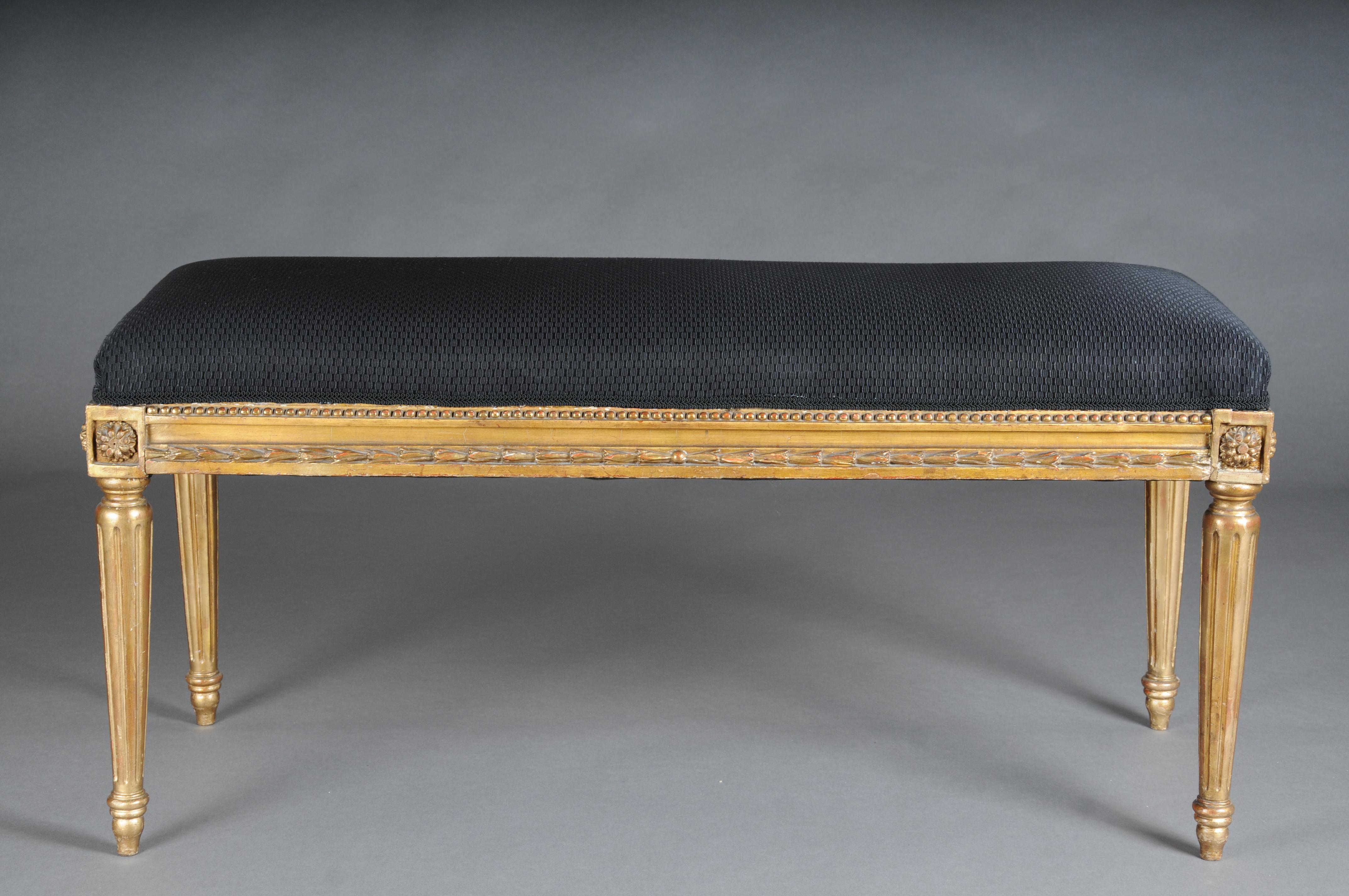 Magnificent antique bench, Louis XVI, gold, beech, around 1870

Impressive and rare bench, France around 1870.
Louis XVI made of solid beech wood, hand-carved and gilded. The seat cover was freshly upholstered and covered a few months ago by a