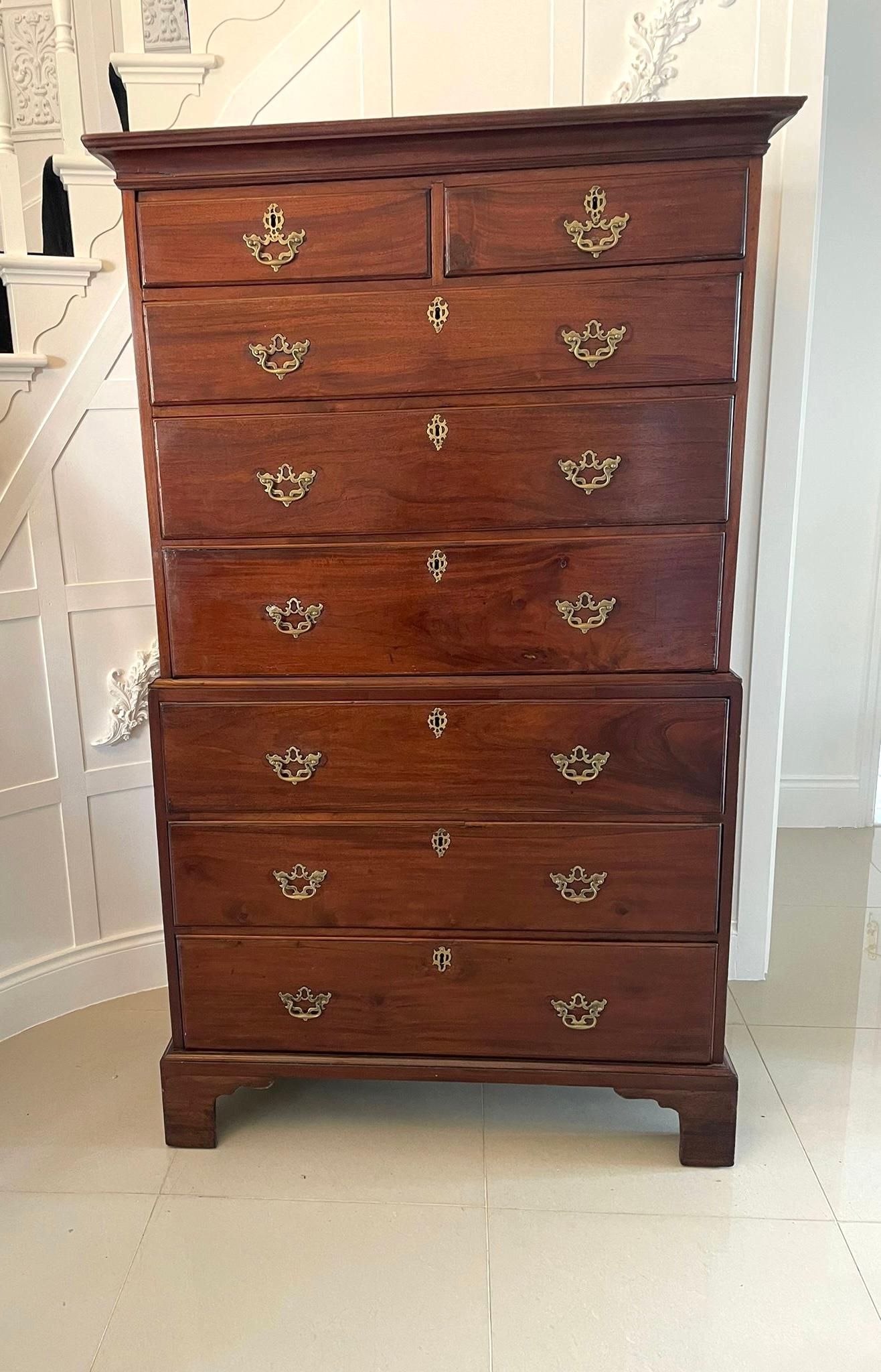 Magnificent George III mahogany chest on chest is a magnificent example of quality and craftsmanship from the Georgian period. It boasts a shaped moulded cornice above two short and three long graduated drawers. The base has three long drawers