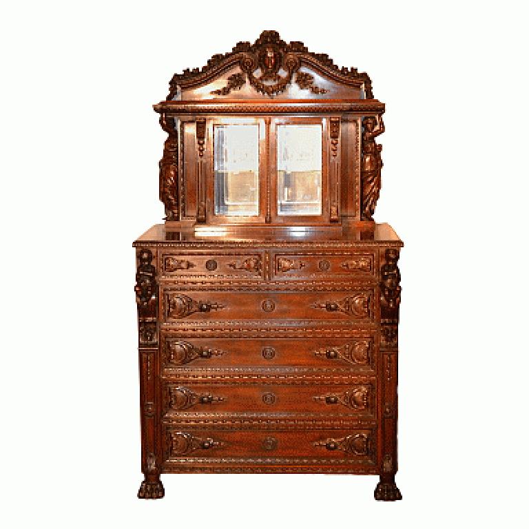 This magnificent bed suite includes the bed, chest, dressing table and a lamp. If you are interested in this suite, please contact us for additional photos.
Carvings include cherubs, pomegranates and grape motifs. Measures: Chest 44 3/4