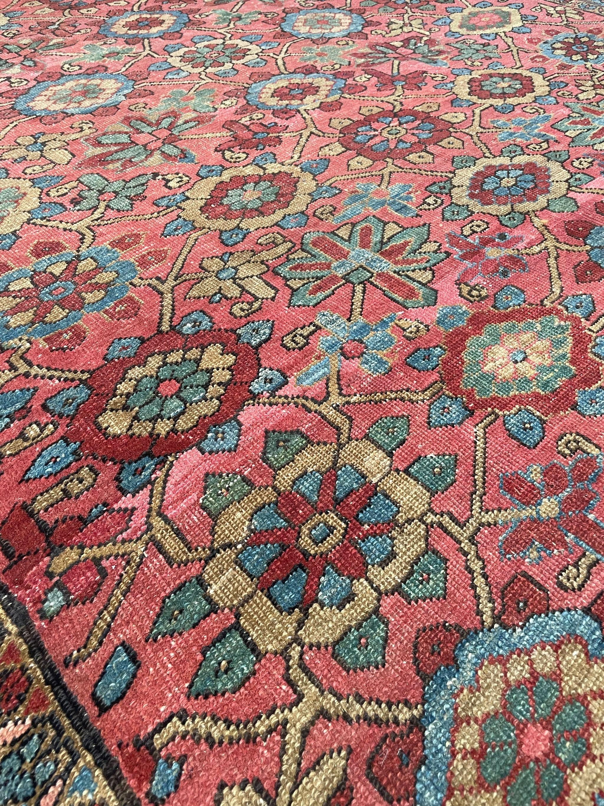 Magnificent antique Persian Heriz with Rare Mina-Khani design glowing pink, bakshayesh blue, camel, green

About: Beyond unique in size, colors, weave, condition, and design - this piece is a showstopper. Glowing pinks surrounded by bakshaeysh ice