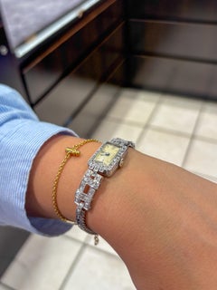 Prächtige Art-Déco-Opernuhr aus Platin und Diamanten mit Schlange aus 18 Karat Weißgold