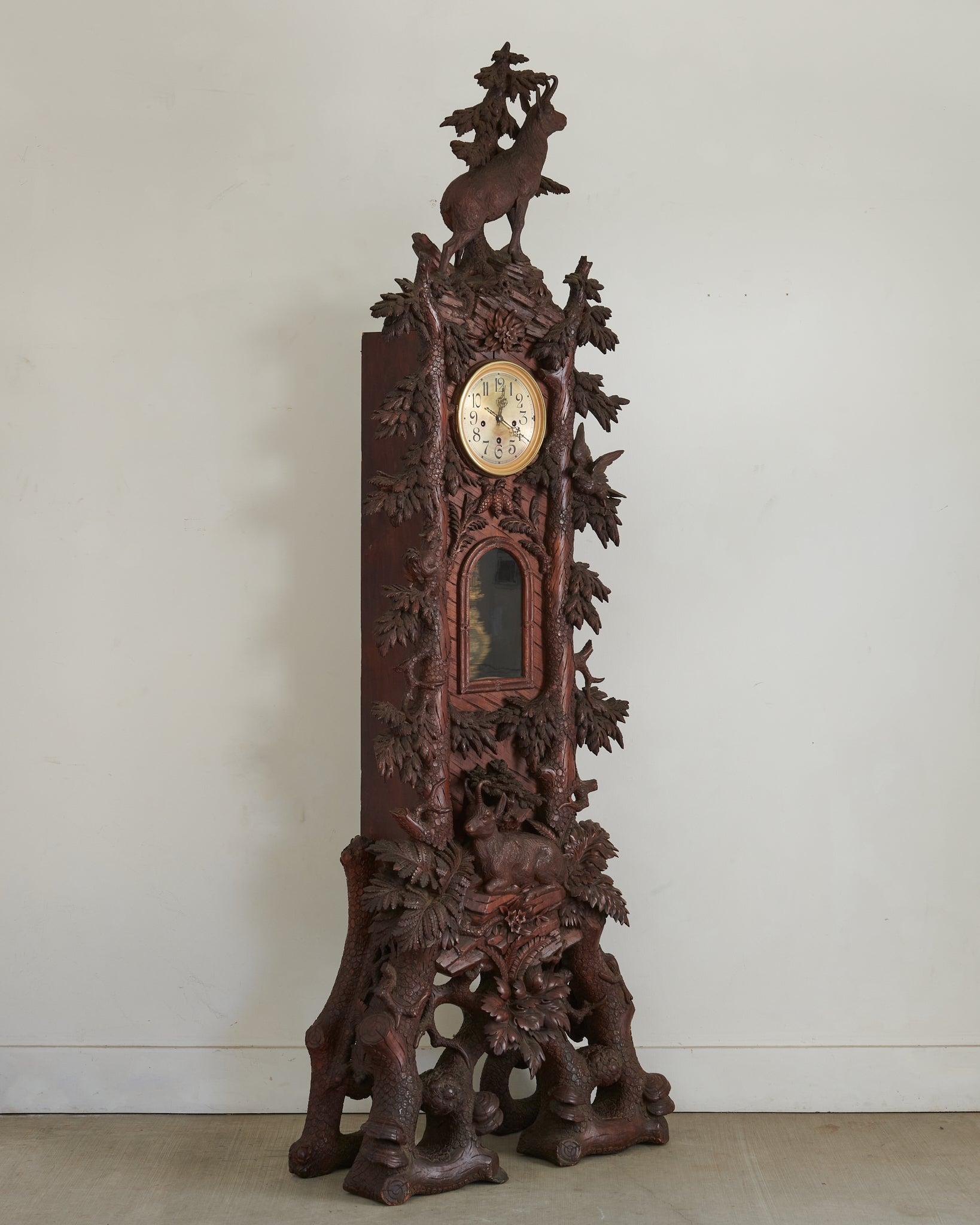 Unlike the early 20th C examples which usually have bear carvings, this has a mountain goat, a squirrel a bird and intricate carvings throughout. In very good condition.  