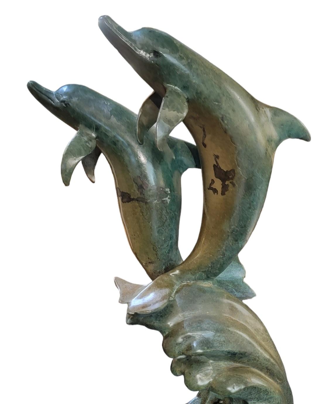 Magnificent Bronze Dolphine Garden Statue Measures approx - 52h x 25 diameter

This garden fountain / garden statue is a beautiful garden element that demands its own space. The base of the fountain has dolphin motifs all around the center of the