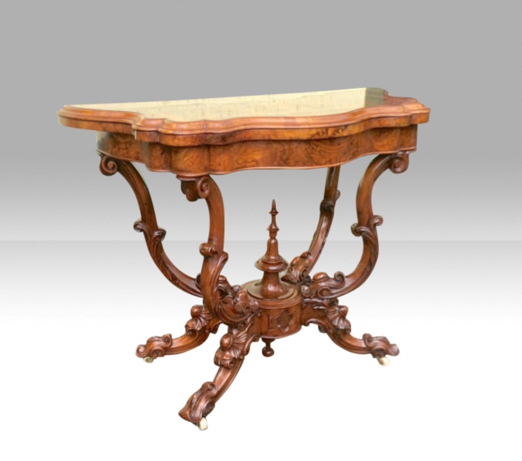 Magnificent Burr Walnut serpentine shaped antique games card table, which turns and folds over to reveal green baize playing surface sitting on a magnificent carved Cradle base .
Stunning Condition.
Circa 1870
Dimensions
Height = 74 cm (29.5