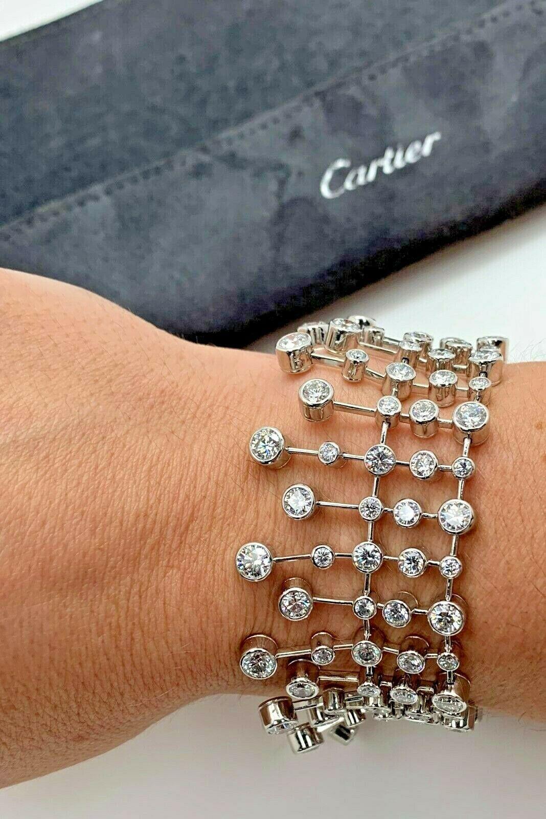 A magnificent Cartier diamond tennis bracelet showcasing 126 of the finest round brilliant cut diamonds set in platinum, the bracelet features a draping and is incredibly comfortable to wear. The bracelet has a total weight of 20.04 cts, and