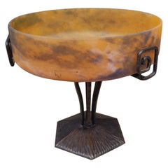 Magnificent circular bowl set in a wrought-iron frame