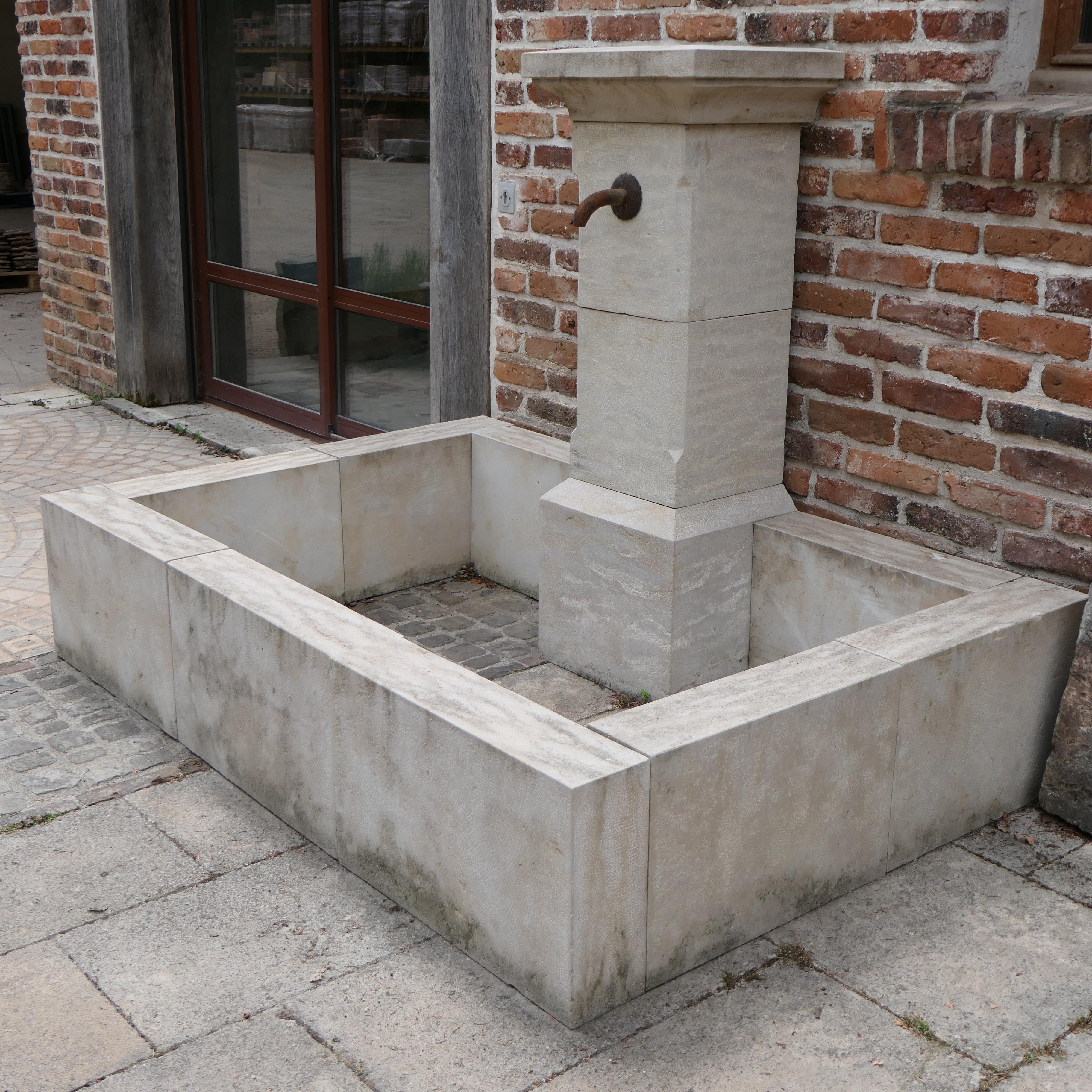 Magnificent Classic Style Natural Stone Wall Fountain In Good Condition For Sale In COULLONS, FR