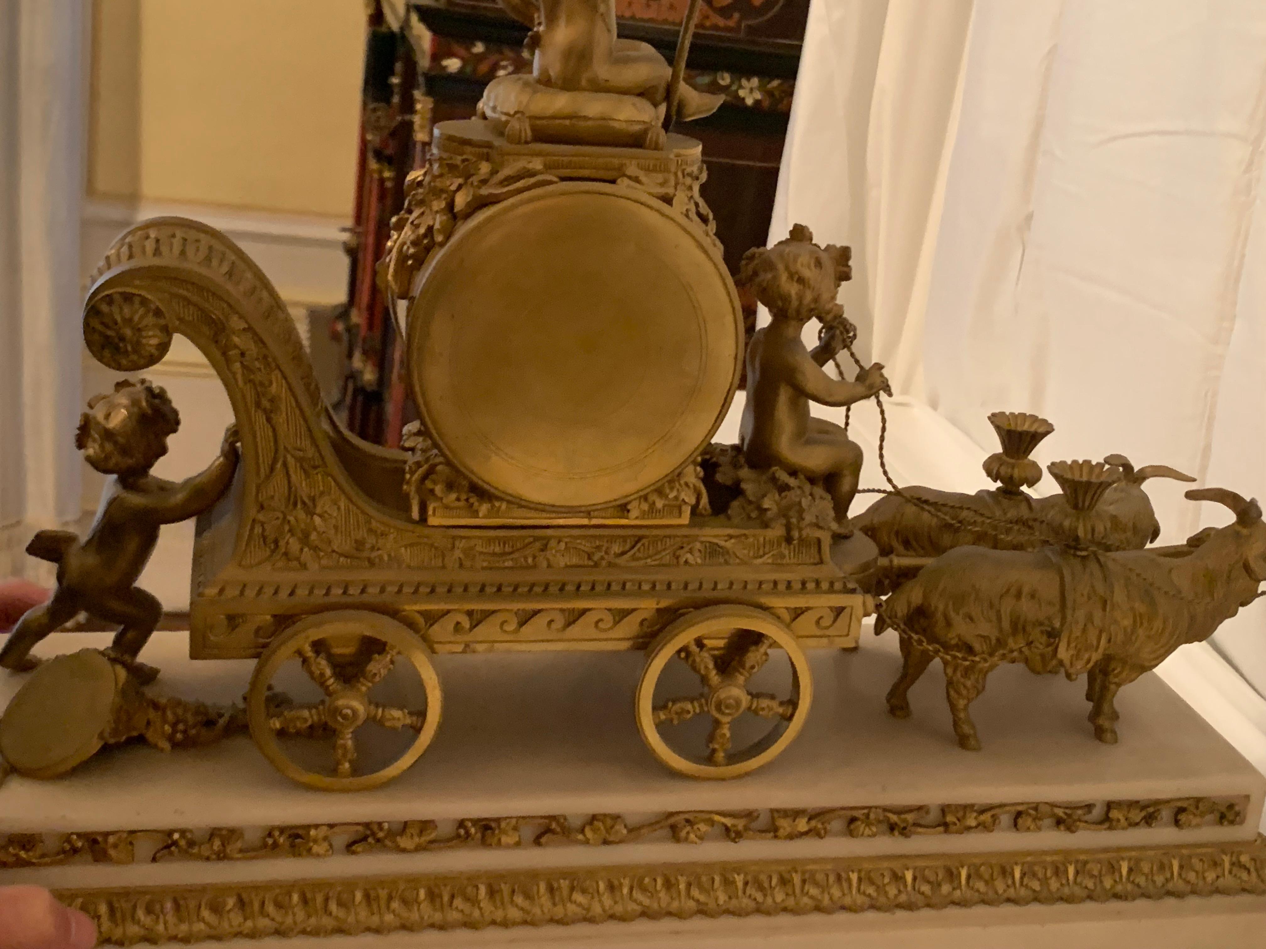 Magnificent 19th Century clock in bronze with cupids pulling a chariot by rams For Sale 3