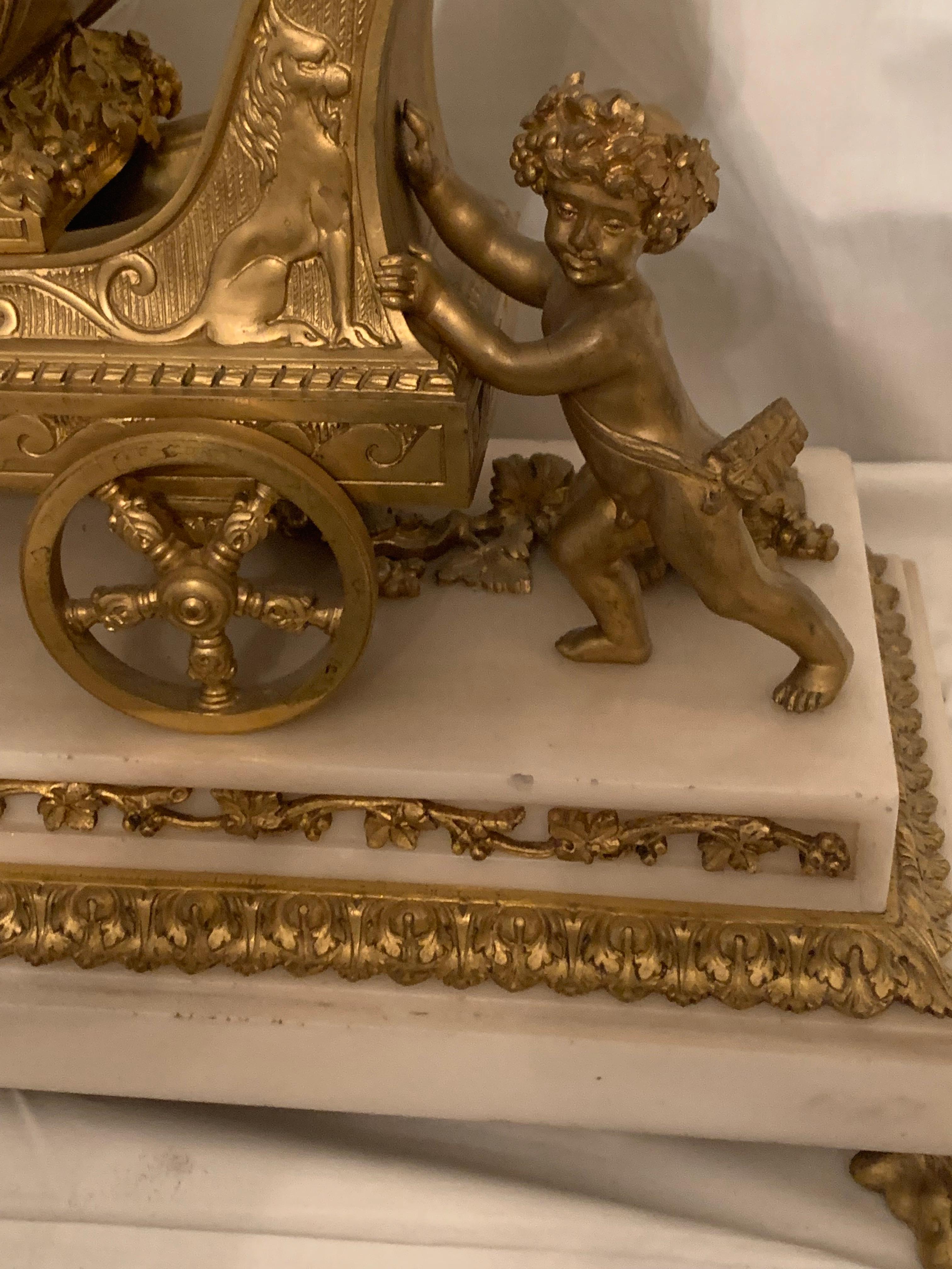 Late 19th Century Magnificent 19th Century clock in bronze with cupids pulling a chariot by rams For Sale