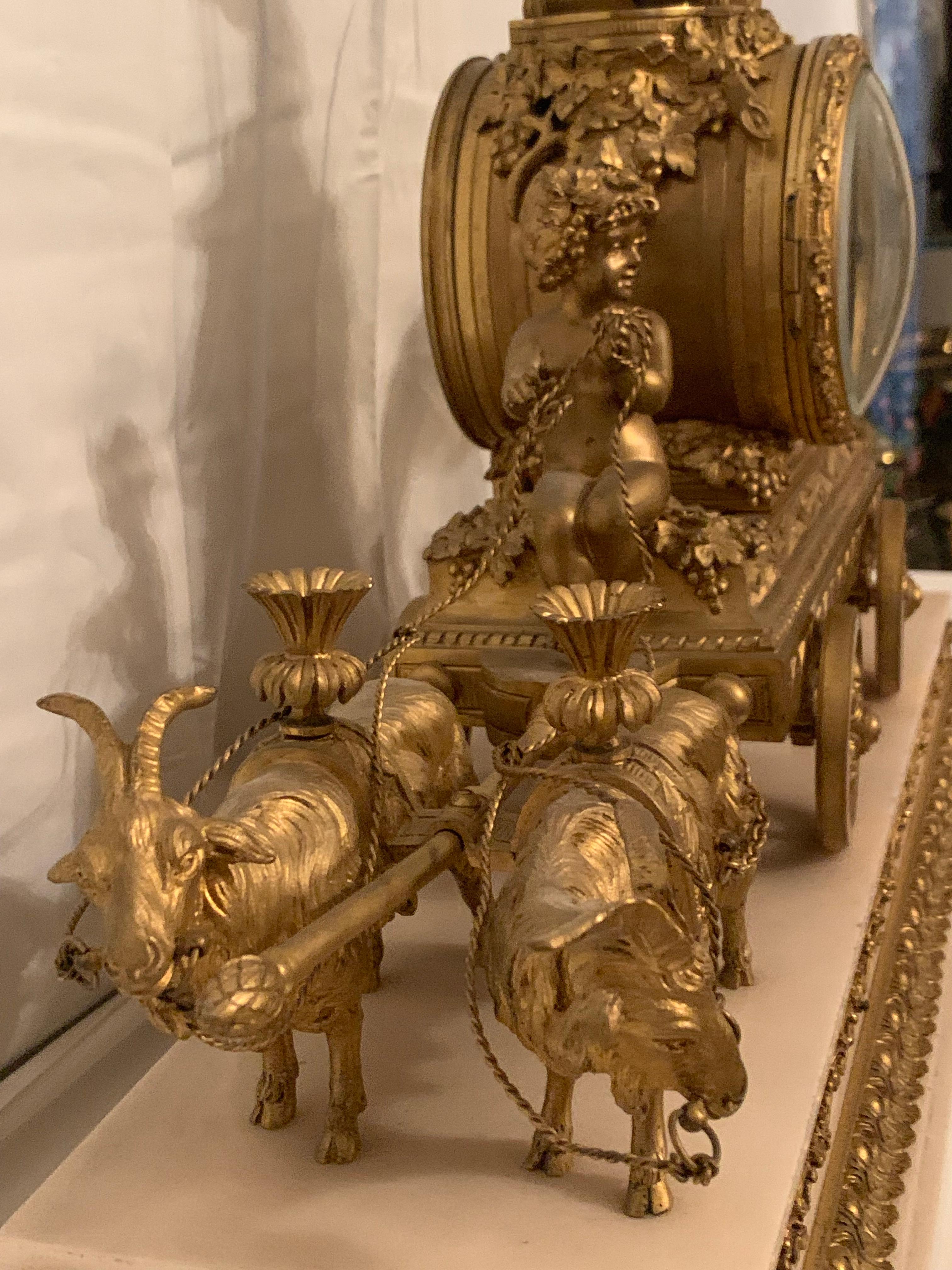 Magnificent 19th Century clock in bronze with cupids pulling a chariot by rams For Sale 1