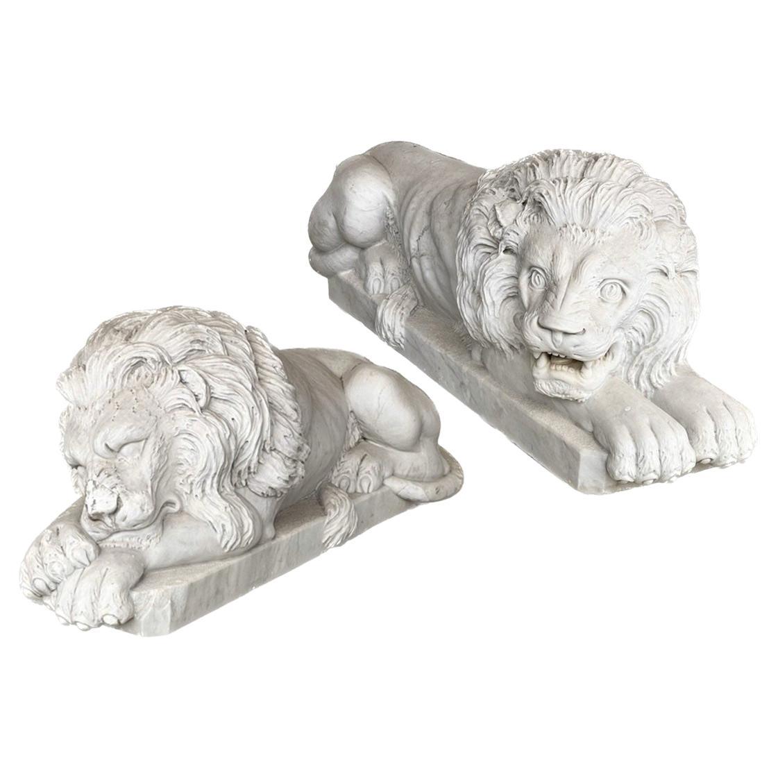 Magnificent Compatible Pair Of  Recumbent  Carved Marble Lions For Sale