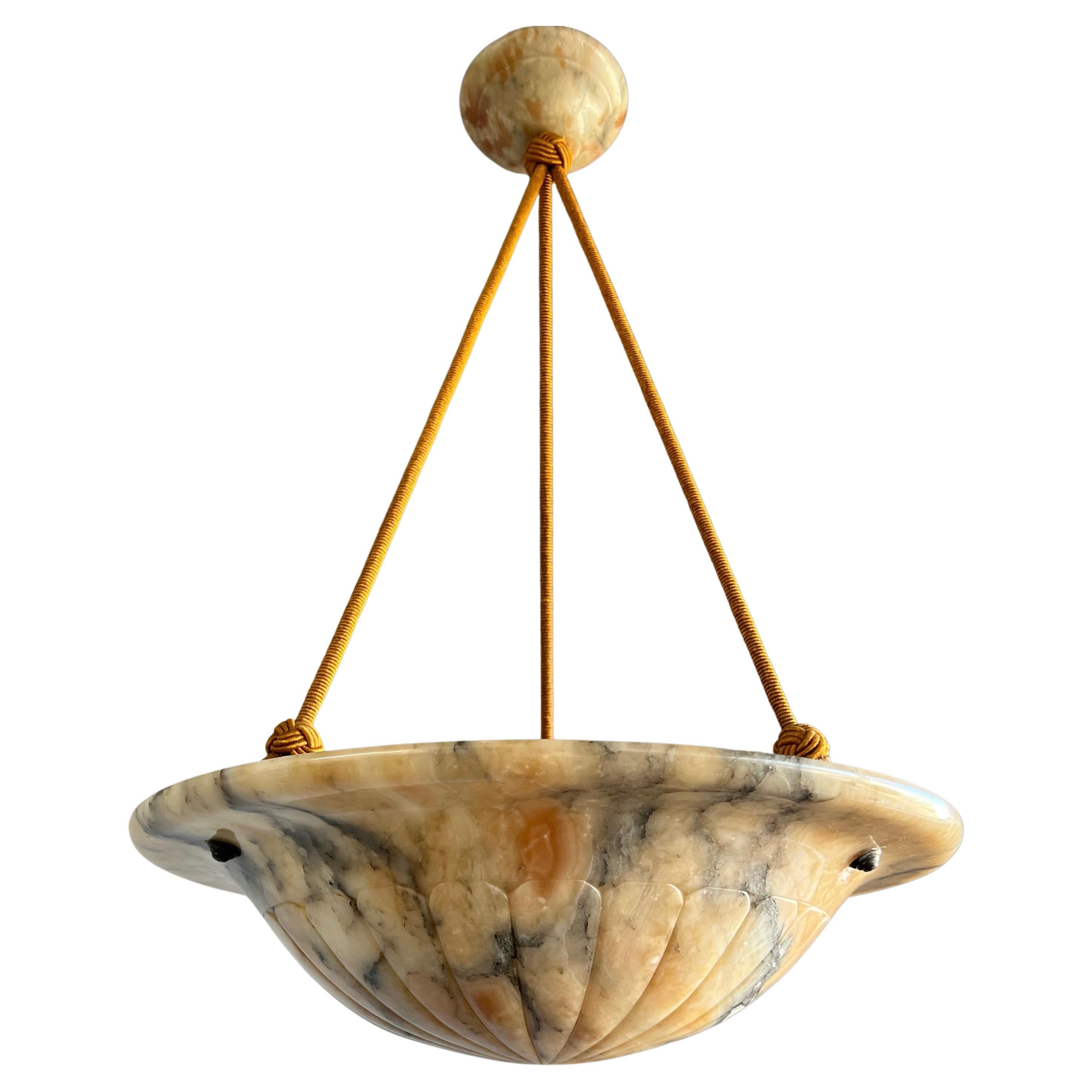 Large and unique top quality, mint condition alabaster chandelier with amber colored patches / clouds. 

One of the qualities of alabaster pendants is that no two shades will ever be exactly the same. Mother Nature created this mineral stone over