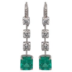 Magnificent Dangling Earrings with 5.29ct Colombian Emerald, 1.51ct Diamonds