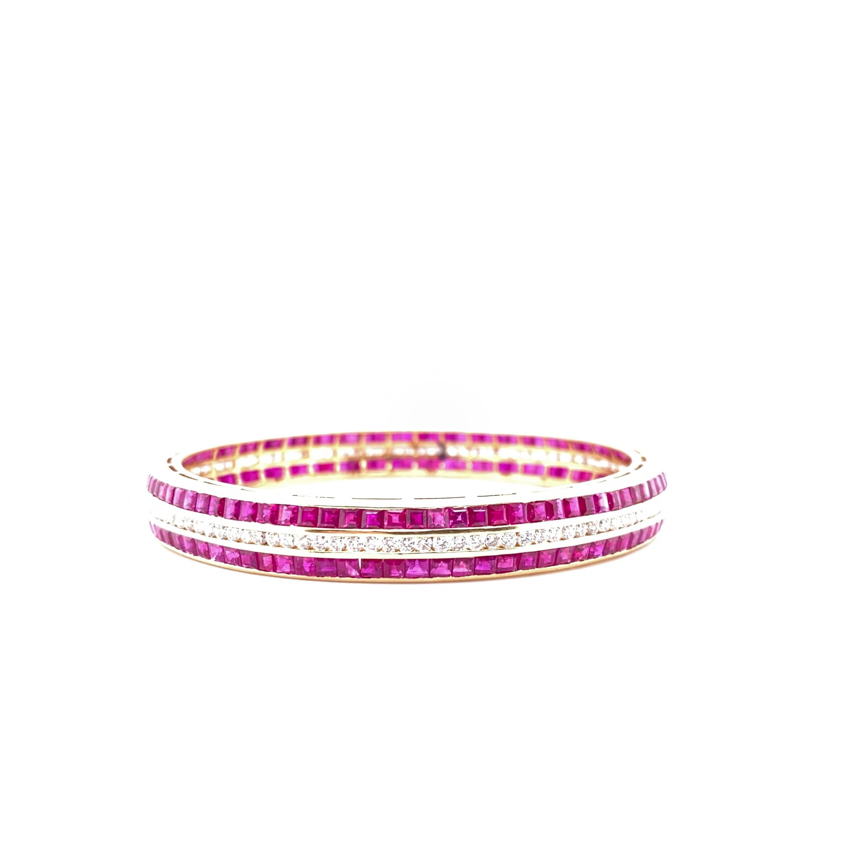 Vibrant bracelet bangle. This One of a kind Diamond and Ruby bracelet features high quality diamonds and beautiful Ruby’s. The unique line up of diamonds and Ruby’s makes this bangle a showstopper.
fits small size wrists.