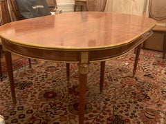 Magnificent dining table and eight chairs with ormolu bronze