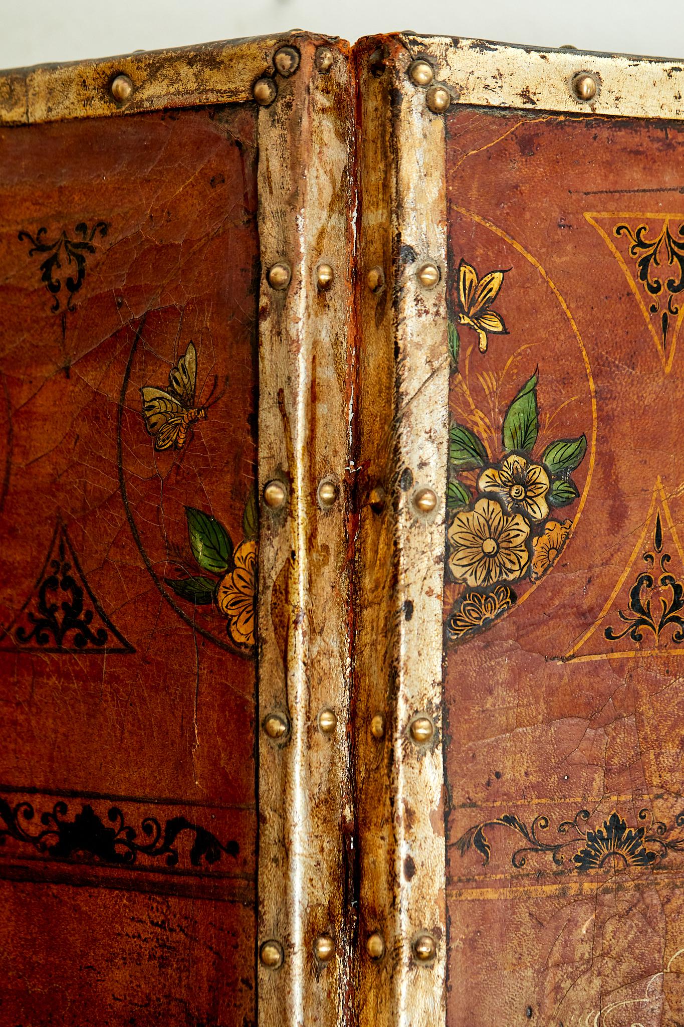 Leather Magnificent embossed leather screen with four-leaf China decoration, circa 1800.
