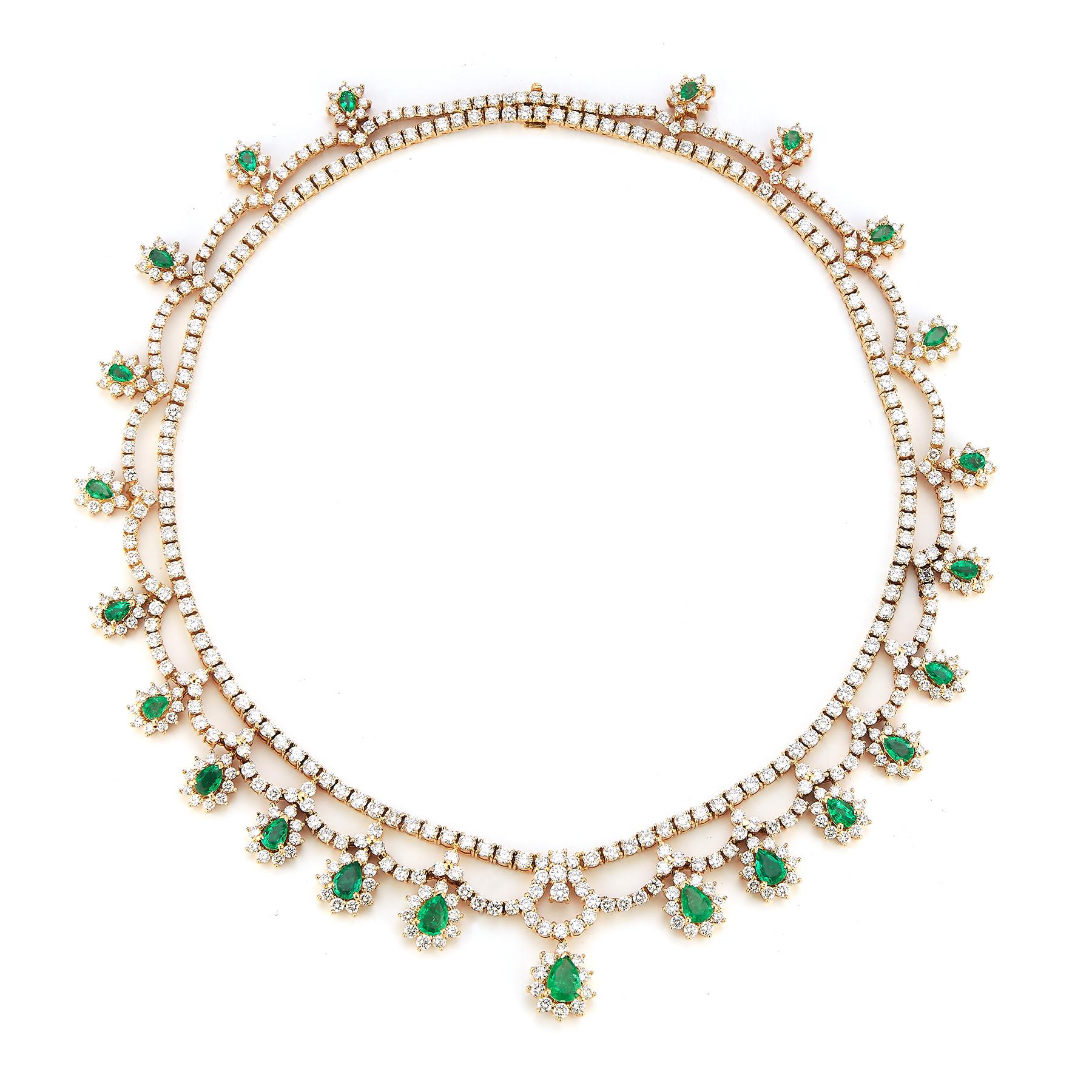 Magnificent Emerald & Diamond Necklace
Emerald necklace with 23 pear shaped emeralds approximately 9.60 cts.  
538 round diamonds approximately 28.45 cts 
18k yellow gold

Measurements: 16