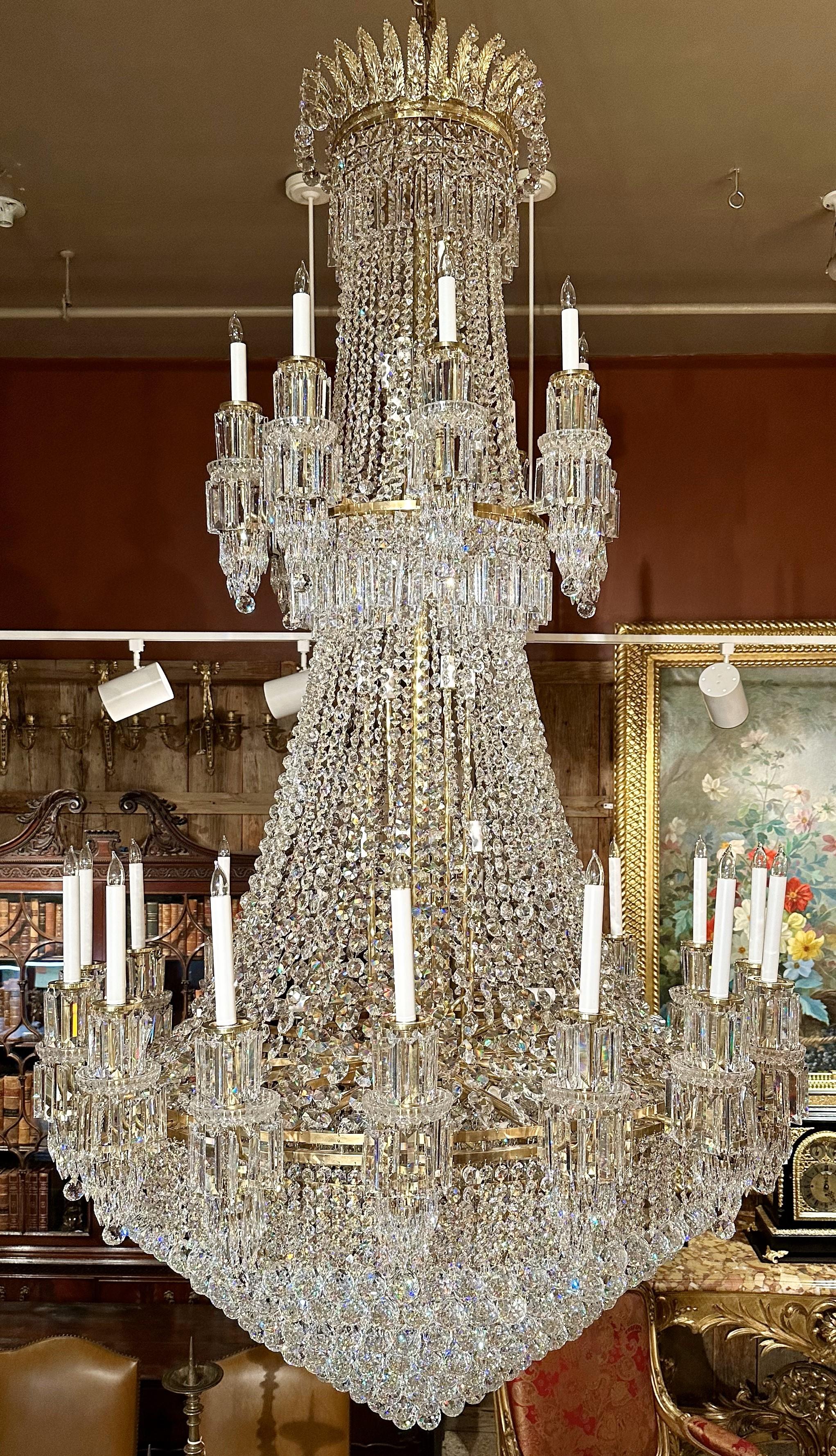 Magnificent English Cut Crystal 60 Light Chandelier.
Blanketed in fine cut crystal beading and prisms, this grand size chandelier was from the London home of the Sultan of Brunei on Bishops Avenue.