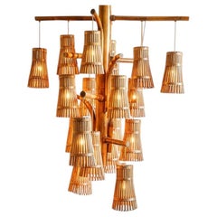Magnifico lampadario extra large in rattan Rotan e ottone, intrecciato a mano