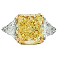 Magnificent Fancy Yellow 7.49 Carat Cushion Cut Diamond Engagement Ring