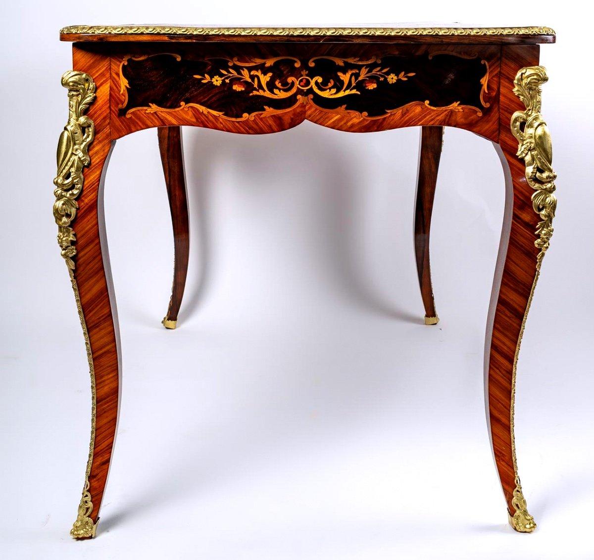 Sublime piece of prestige, a magnificent flat desk, in the Louis XV style, in marquetry of precious wood with flower decoration. 
It is a magnificent work executed by a master cabinetmaker of Faubourg

Its top reveals an exceptional work of