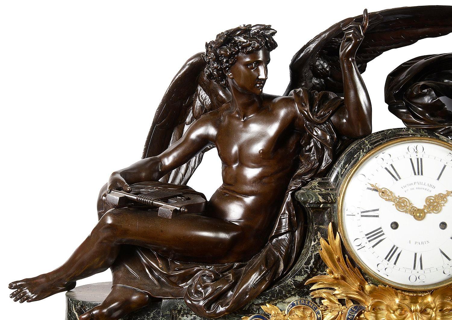 A magnificent 19th century bronze mantel clock depicting allegorical figures representing Geography and literature. The white enamel clock face, Roman numerals, an eight day duration movement, striking on the hour and half hour. Riased on a green