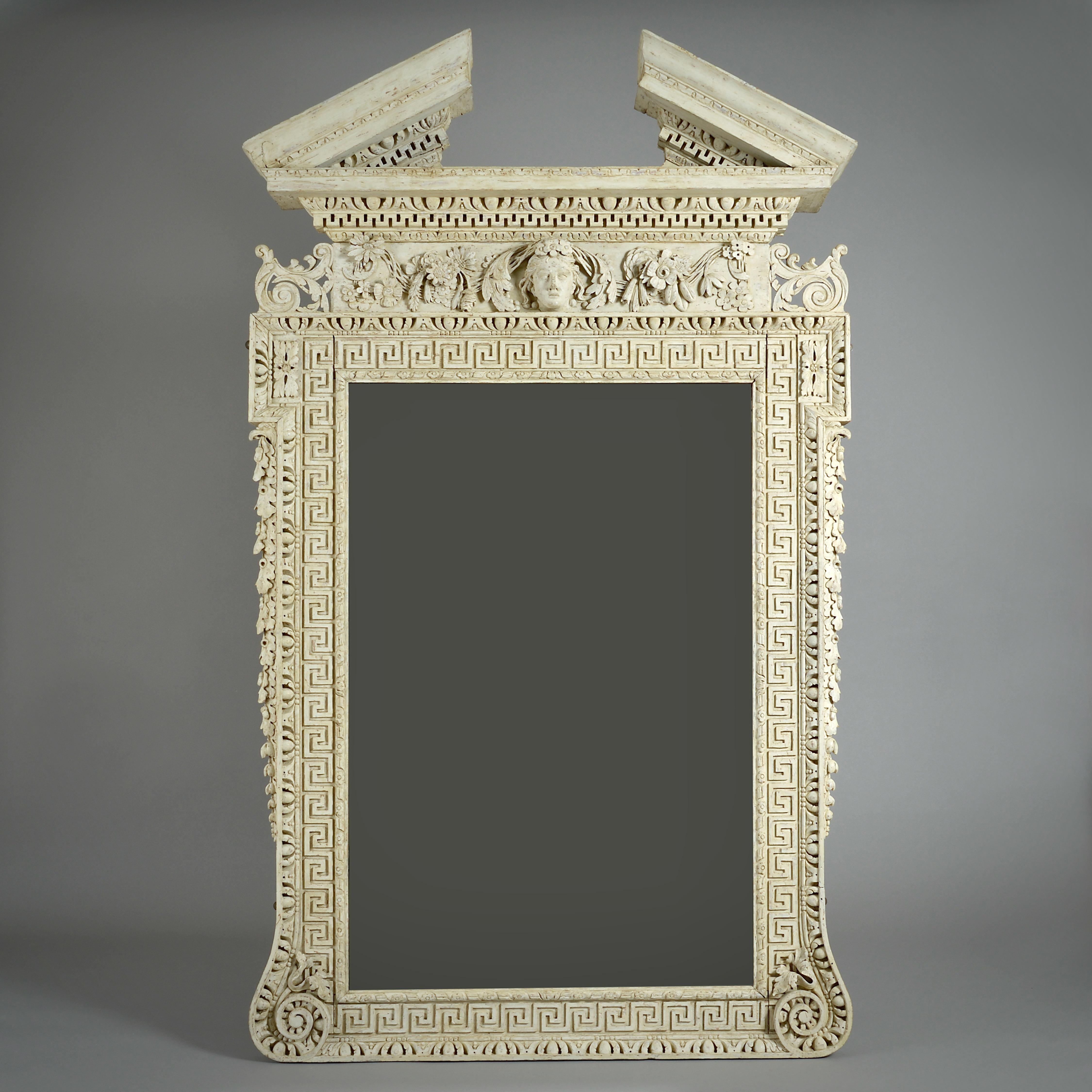UN MAGNIFICO BICCHIERE DA MOLO DI GEORGE II DIPINTO SU PIETRA ALLA MANIERA DI WILLIAM KENT, 1730 CIRCA.

Scolpito in legno di tiglio e pino baltico. La cornice a chiave greca con orecchie è sormontata da un fregio con una maschera di Flora