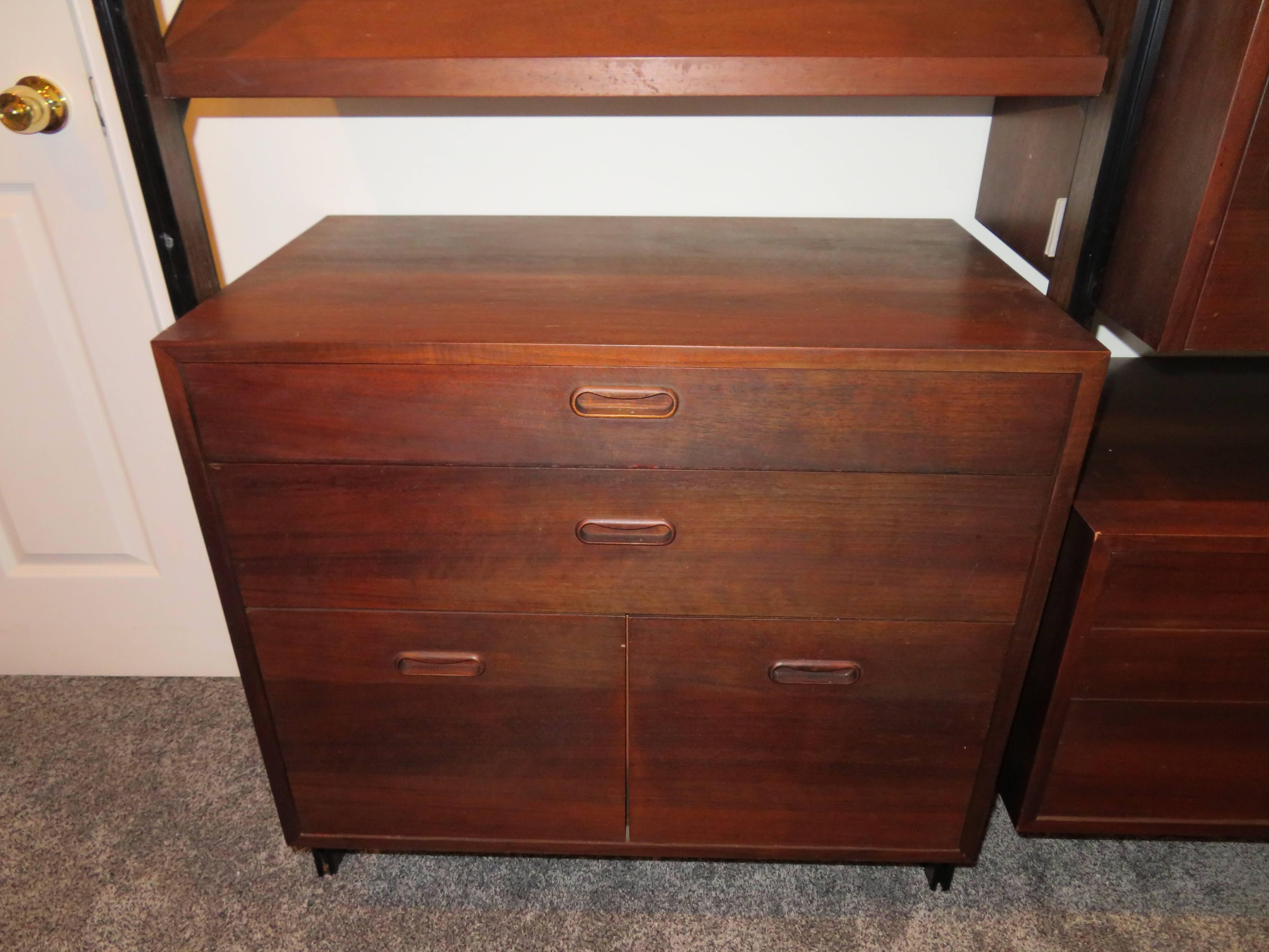 Magnificent George Nelson three Bay Omni wall unit. Just look at all the cabinets included in this set- six in all including three different drawer cabinets, one with two pull-out filing drawers. The other cabinets have doors that open to reveal