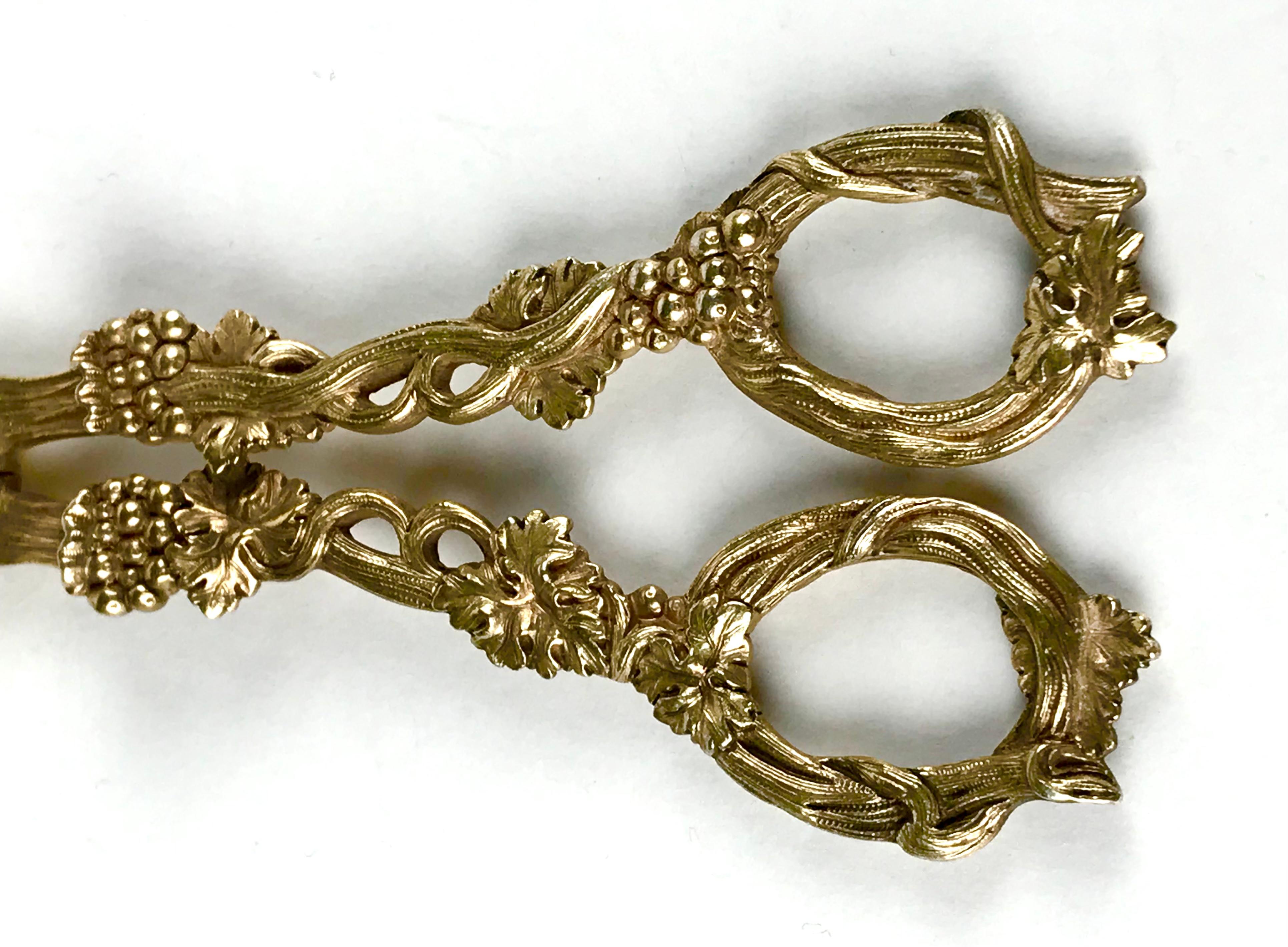 A magnificent pair of solid silver gilt grape scissors 


Hallmarked for Paris, France 1819-1838Silver Fineness .950


Weight 123 grams 

Measure: Length 18.5 cm 


A wonderful heavy cast pair of scissors decorated with vines and grapes