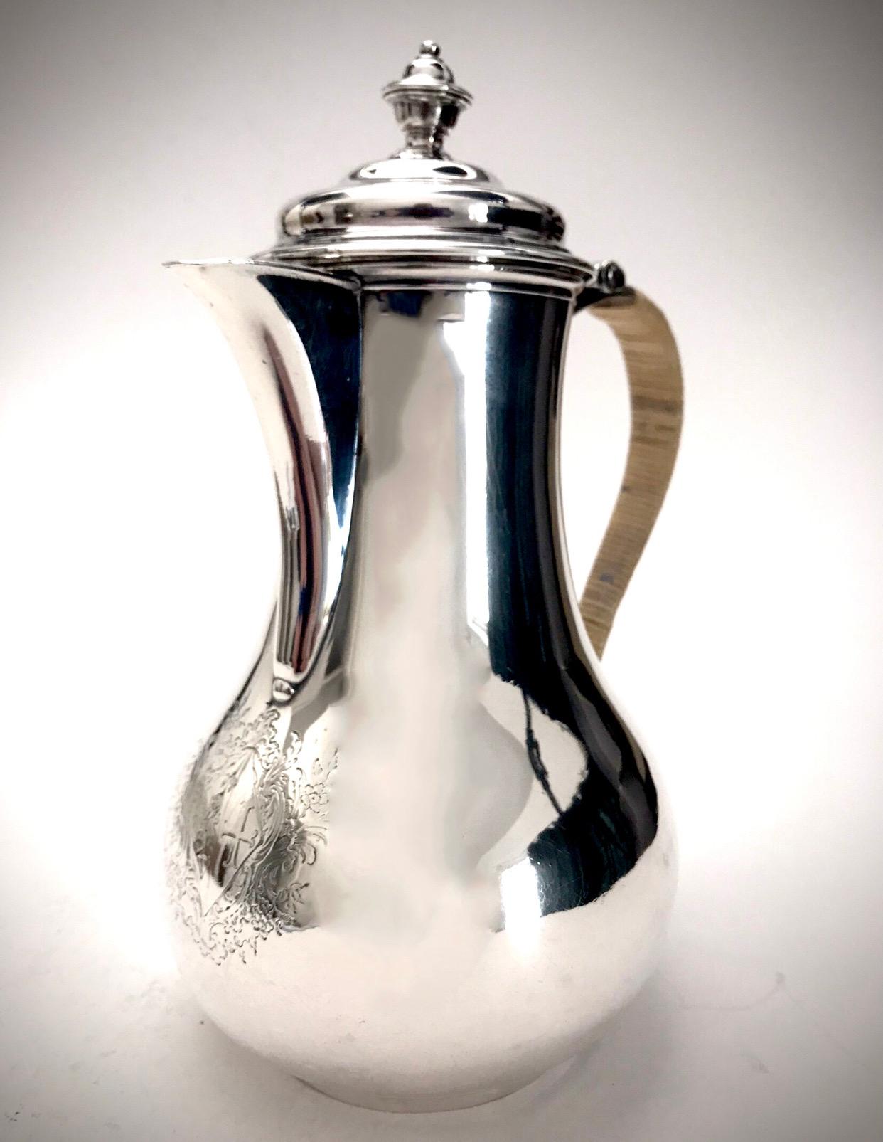 A Rare and magnificent mid 18th century Jug by the famous London Silversmith Paul De Lamerie.

With an armorial crest to the front a classical De Lamerie shape.

Hallmarked for London 1750
Weight 635 grams 
Height 23.5 cm

Paul de Lamerie  was the