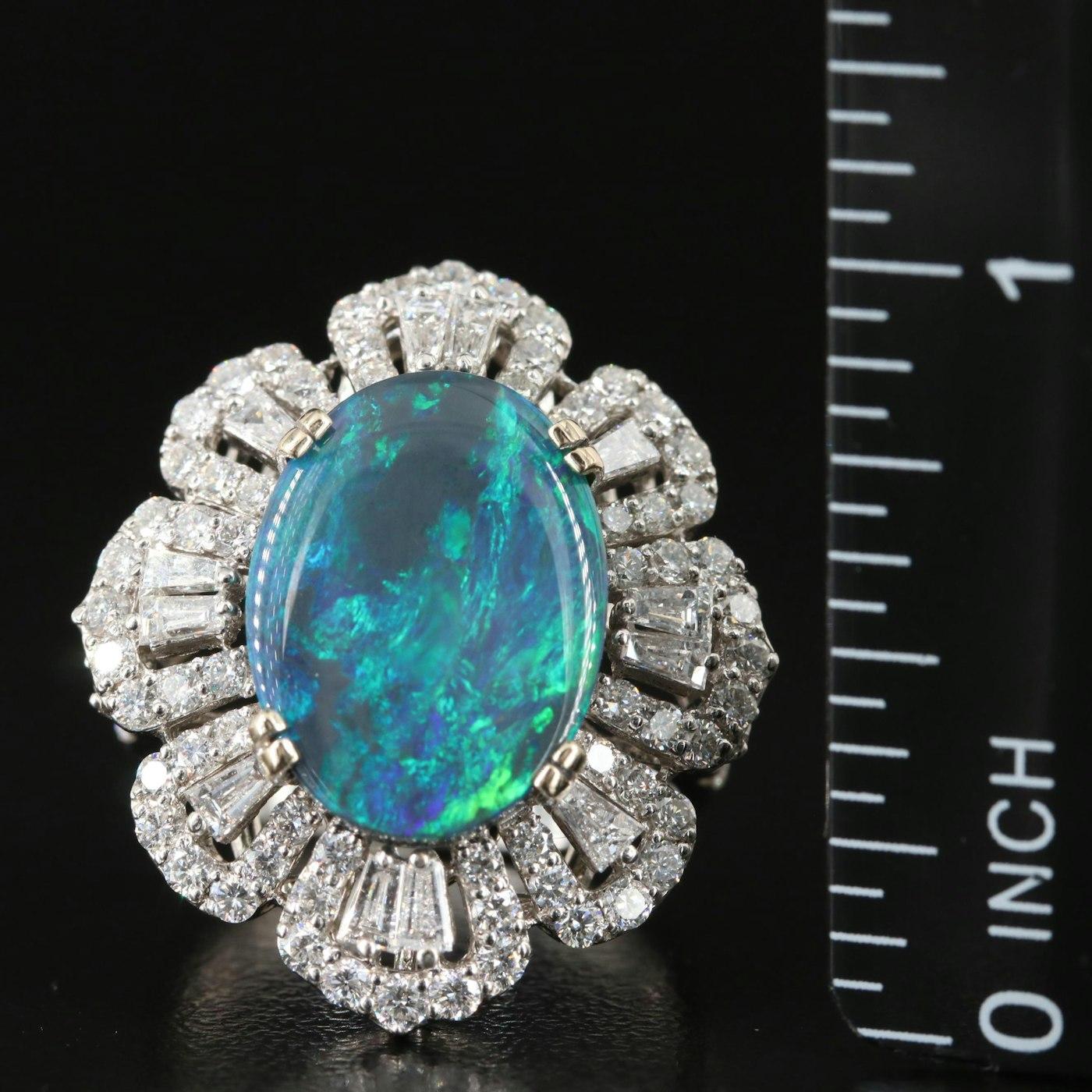 Magnifique bague en or blanc 18 carats GIA 4.63 Opale Noire Naturelle Diamant Estate

Matériau : Or 18K
Taille de l'anneau : 7.50
Poinçons : 18K Ther
Poids total (grammes) : 8.00

PIERRE PRIMAIRE
Type : Opale
Forme : Cabochon ovale double
Dimensions