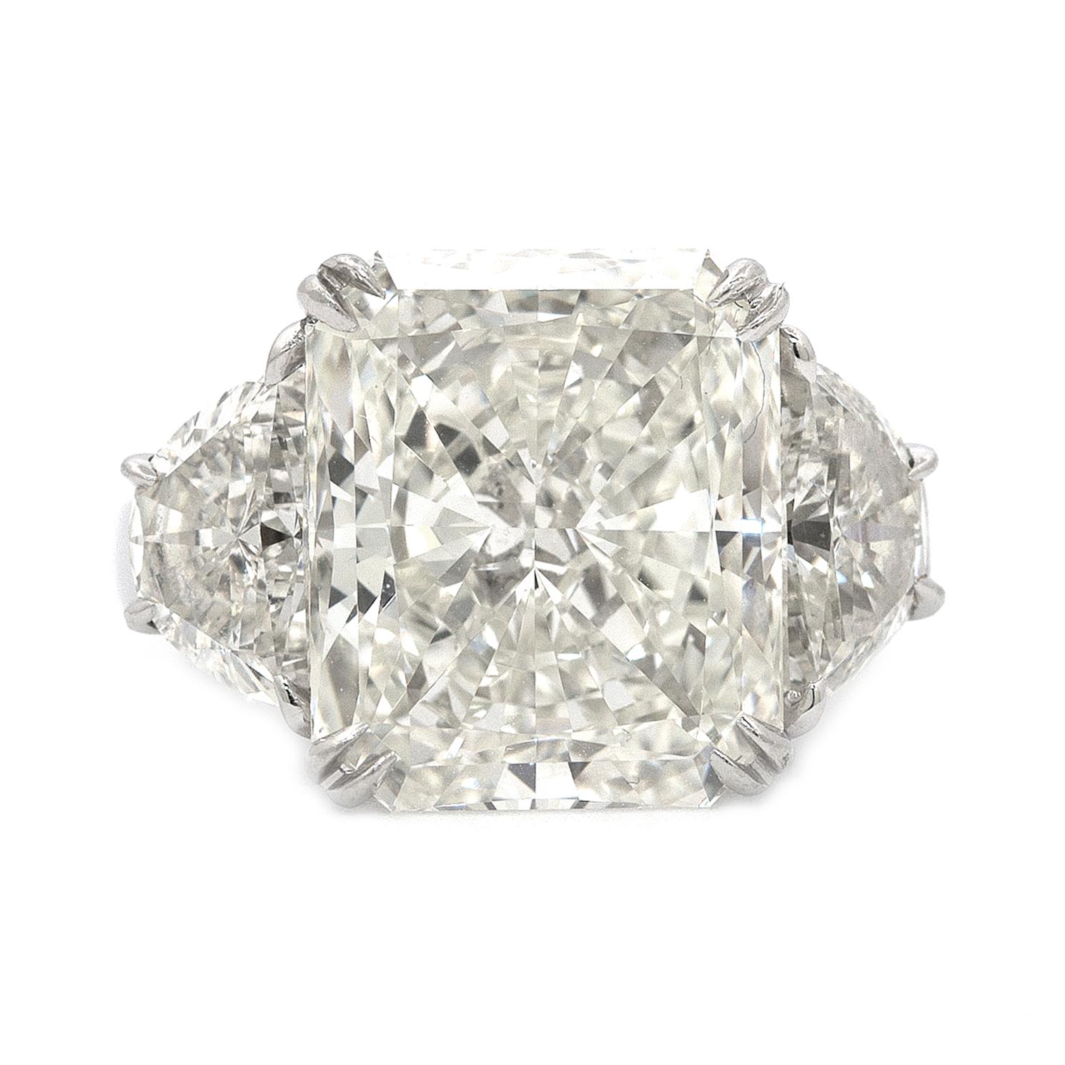 Magnificent GIA Radiant 8.03 Carat in a Platinum Ring with Half Moons 2.01 Carat For Sale