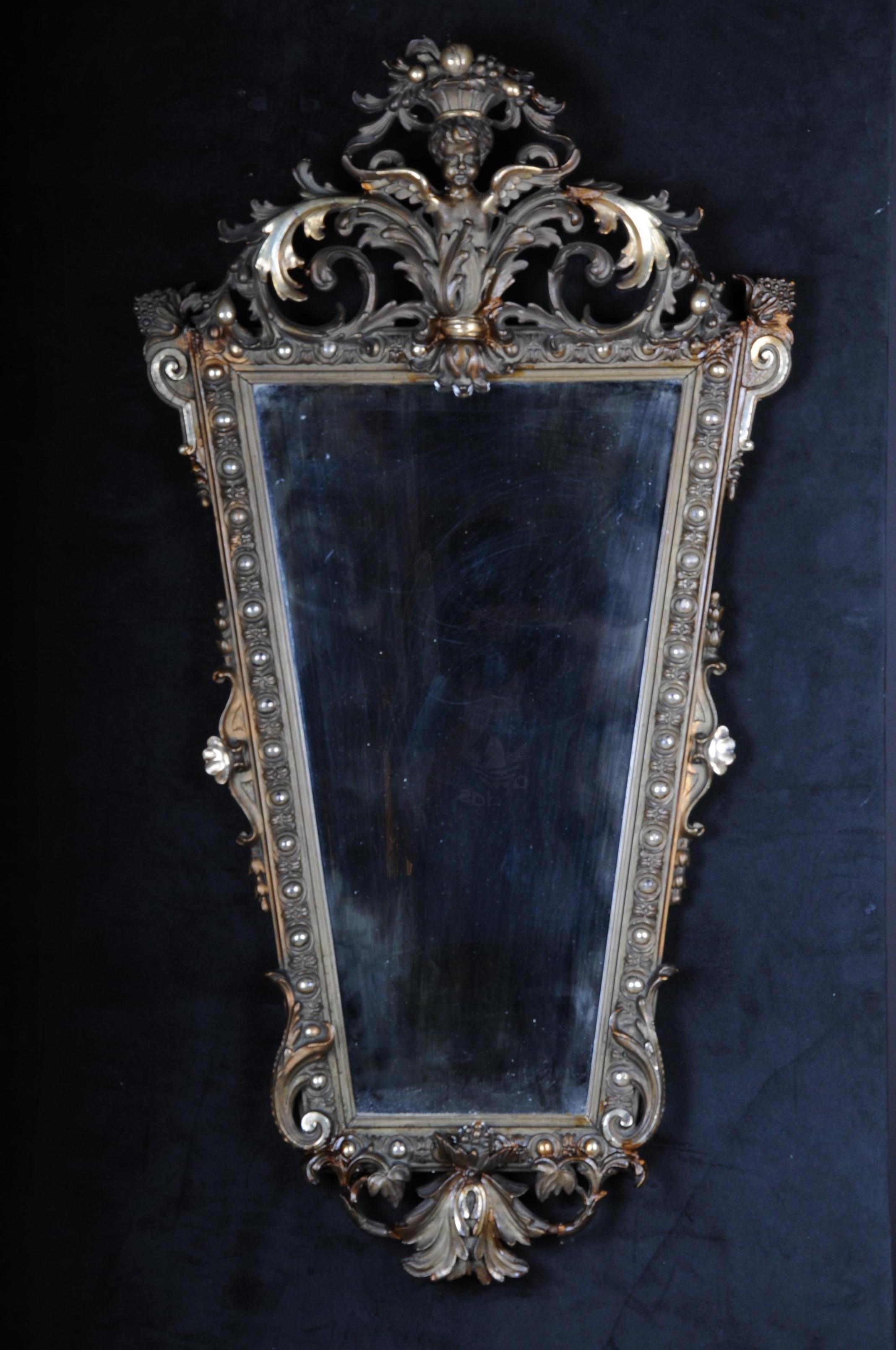 Magnificent golden baroque mirror, circa 1880

High, diamond-shaped historicism wall mirror, gold-plated. Rich ornate decorations with baroque crowning. Extremely decorative and splendid. Restoration sites available.

(M-54).