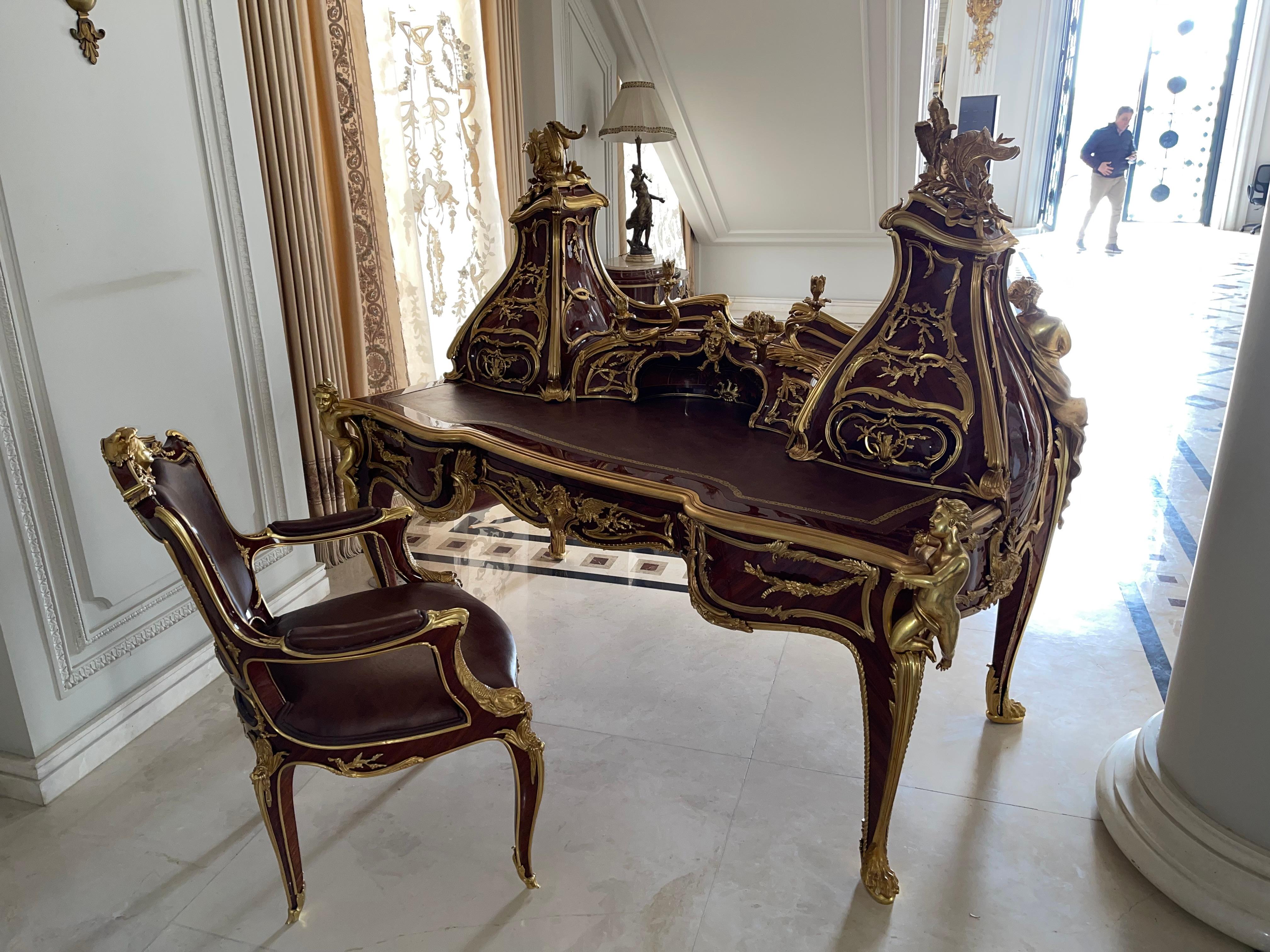 Magnificent grand bureau/writing desk Louis XV, After Francois Linke

The desk has an estimated total weight of approx. 450 kg, bronze weight approx. 250 kg.
Solid beech wood and veneered. Solid bonze, fire-gilded and finely chased.

The