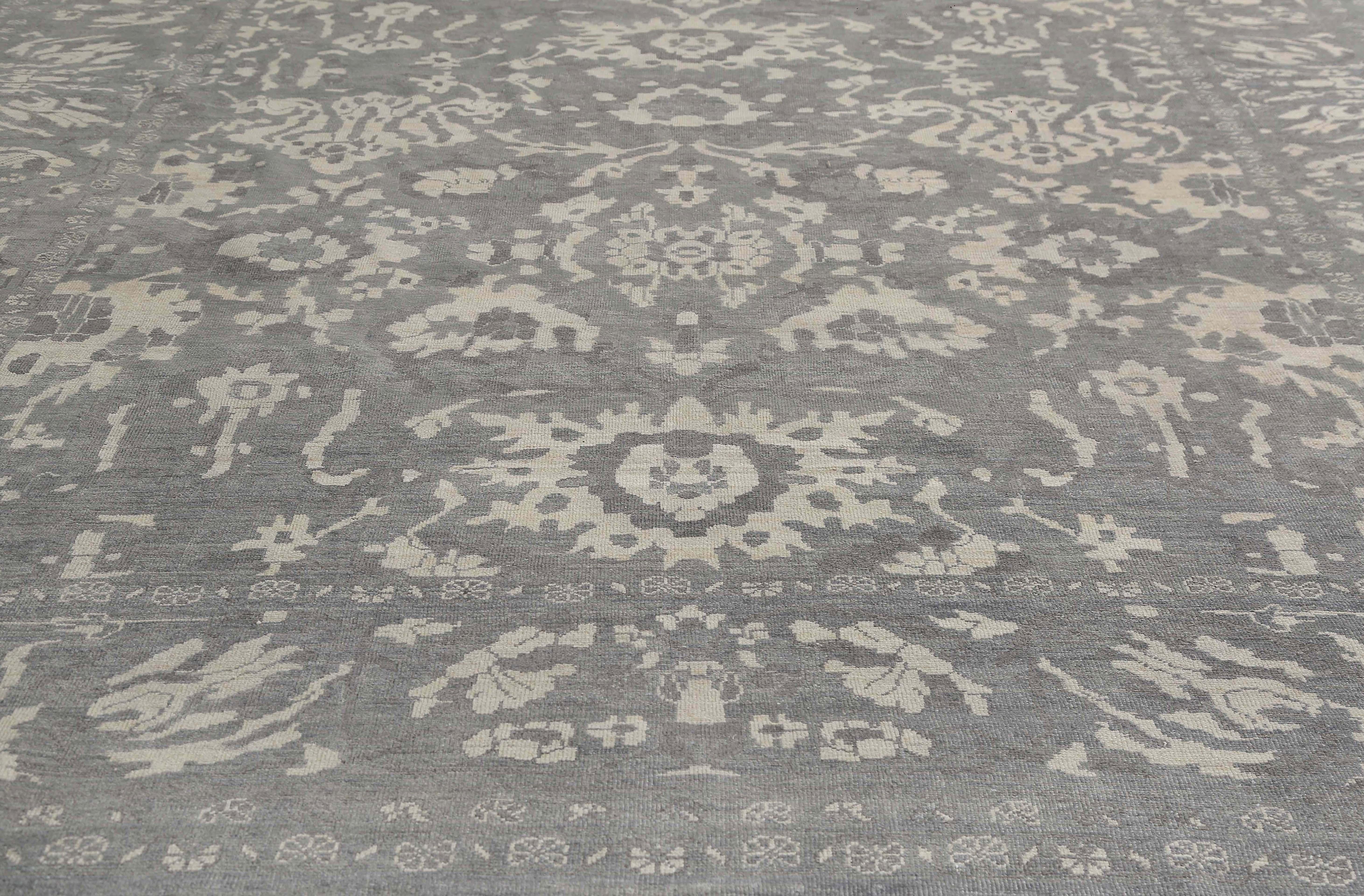 This Turkish Sultanabad Rug is a magnificent piece of traditional design that is sure to add elegance and sophistication to any room. Measuring 12'2