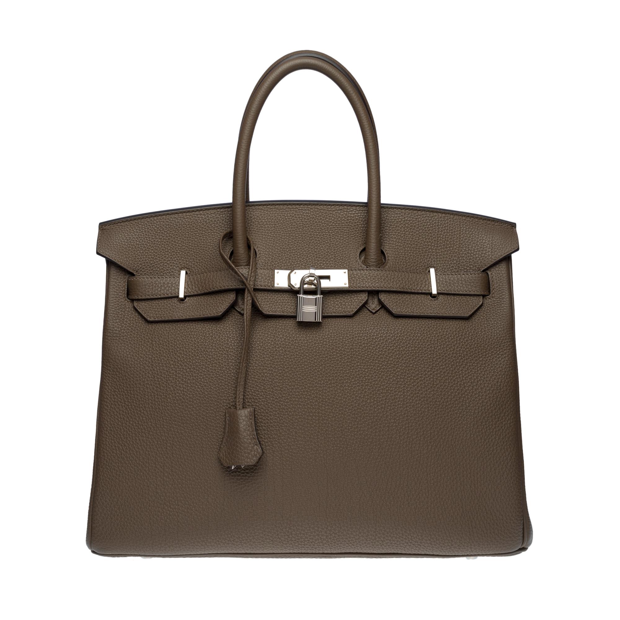Exquisite & Rare Hermes Birkin 35 handbag in Gris Elephant Togo leather , Palladium Silver Metal hardware, double handle in grey leather for hand carrying

Flap closure
Inner lining in grey leather, one zippered pocket, one patch pocket
Signature: