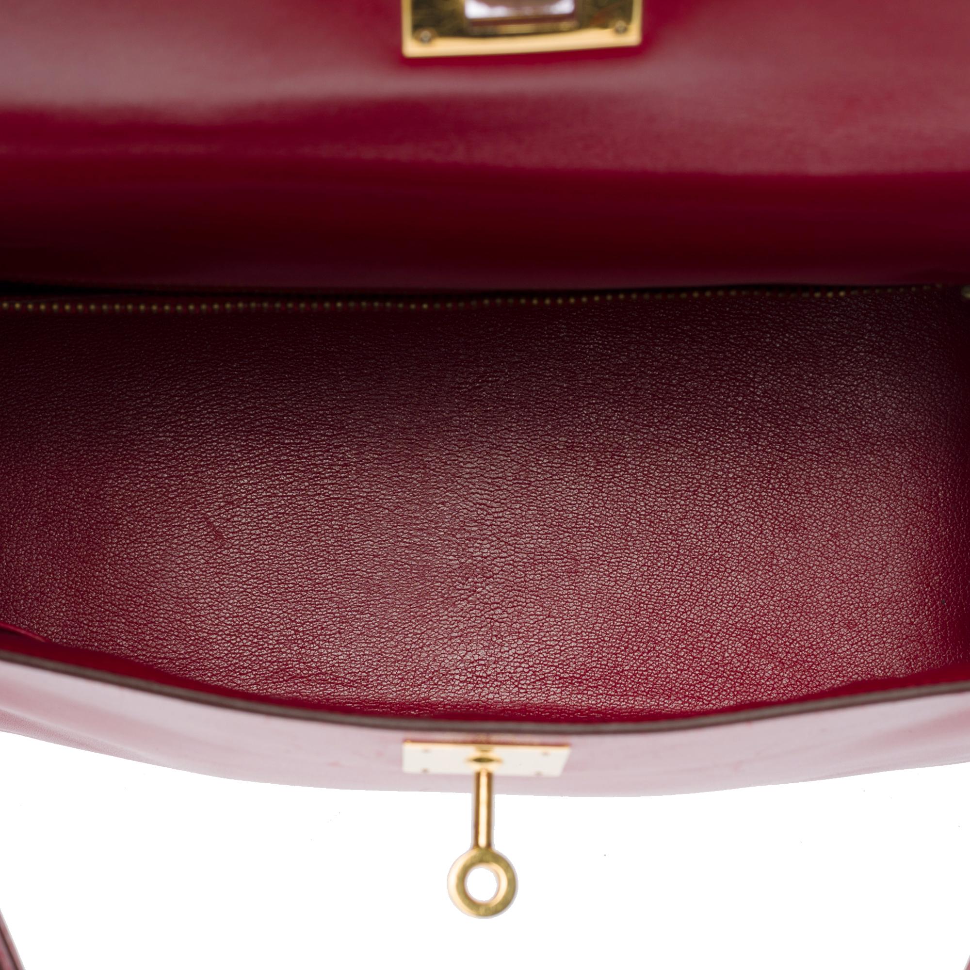 Women's Magnificent Hermes Kelly 28 retourne handbag strap in Burgundy box calfskin, GHW