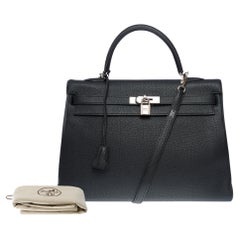 Magnificent Hermès Kelly 35 retourne handbag strap in Black Togo leather , PHW