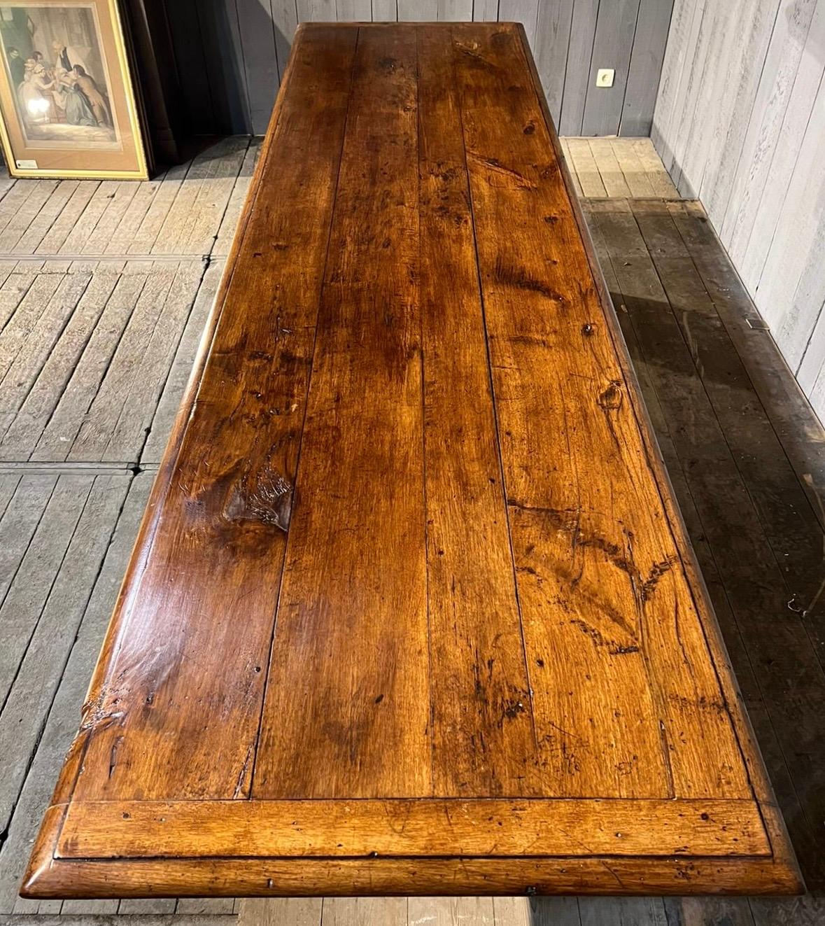 A simply stunning French Solid Walnut Dining Table. Dating to the later part of the 19th Century and having a wonderful Original colour and patina which we have brought out with a wax. Its long at 3.2 meters and made from solid Walnut which is