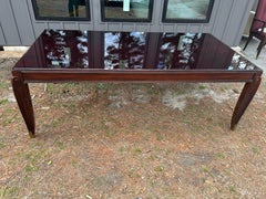 Magnífica Mesa de Comedor Jean Pascaud Art Decó de Caoba y Cristal Sabots de Bronce