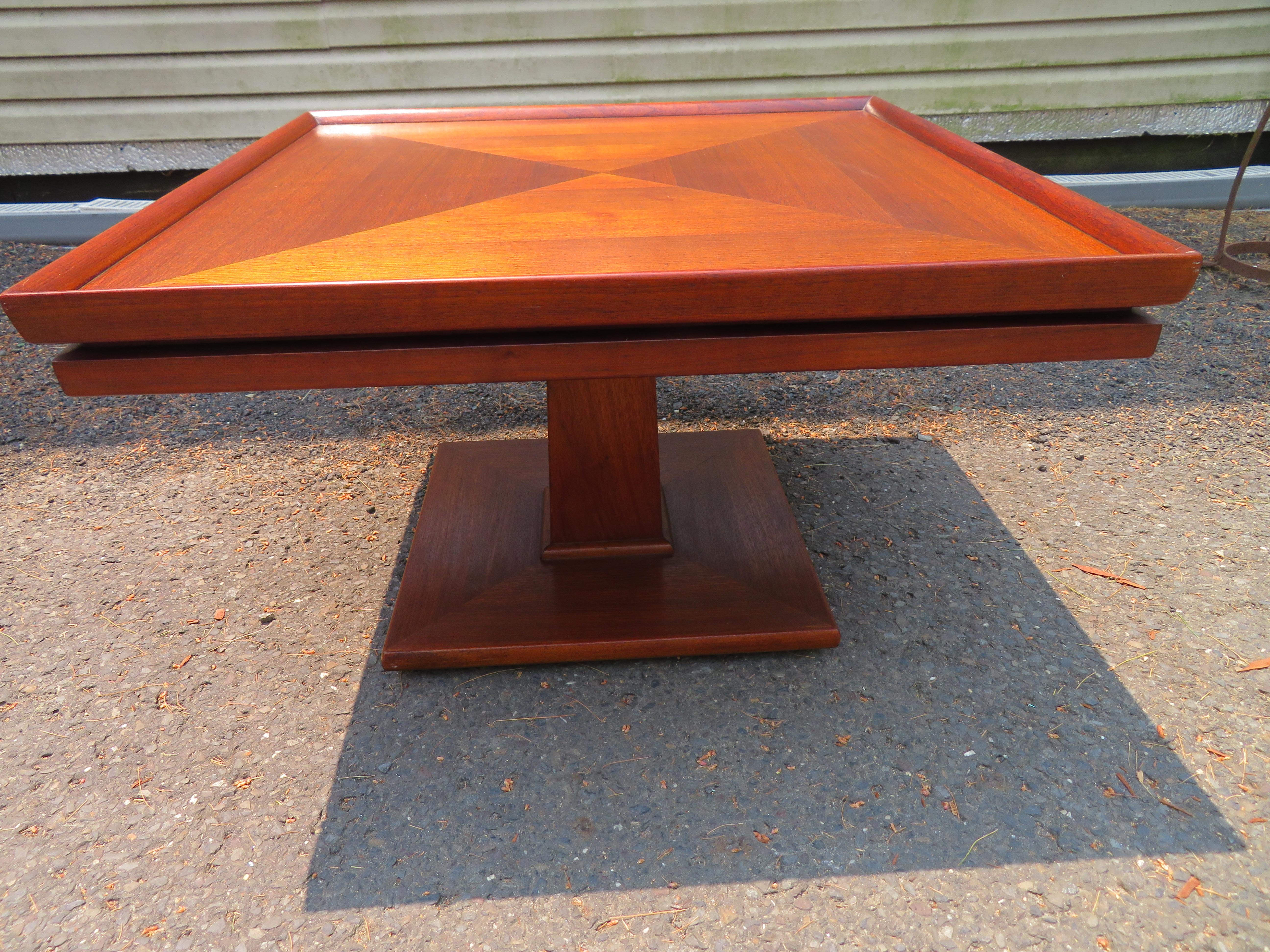 Magnificent square coffee or side table by Widdicomb for John Stuart circa 1950. This fine table is in very nice vintage condition with only light signs of age. It measures 18.5