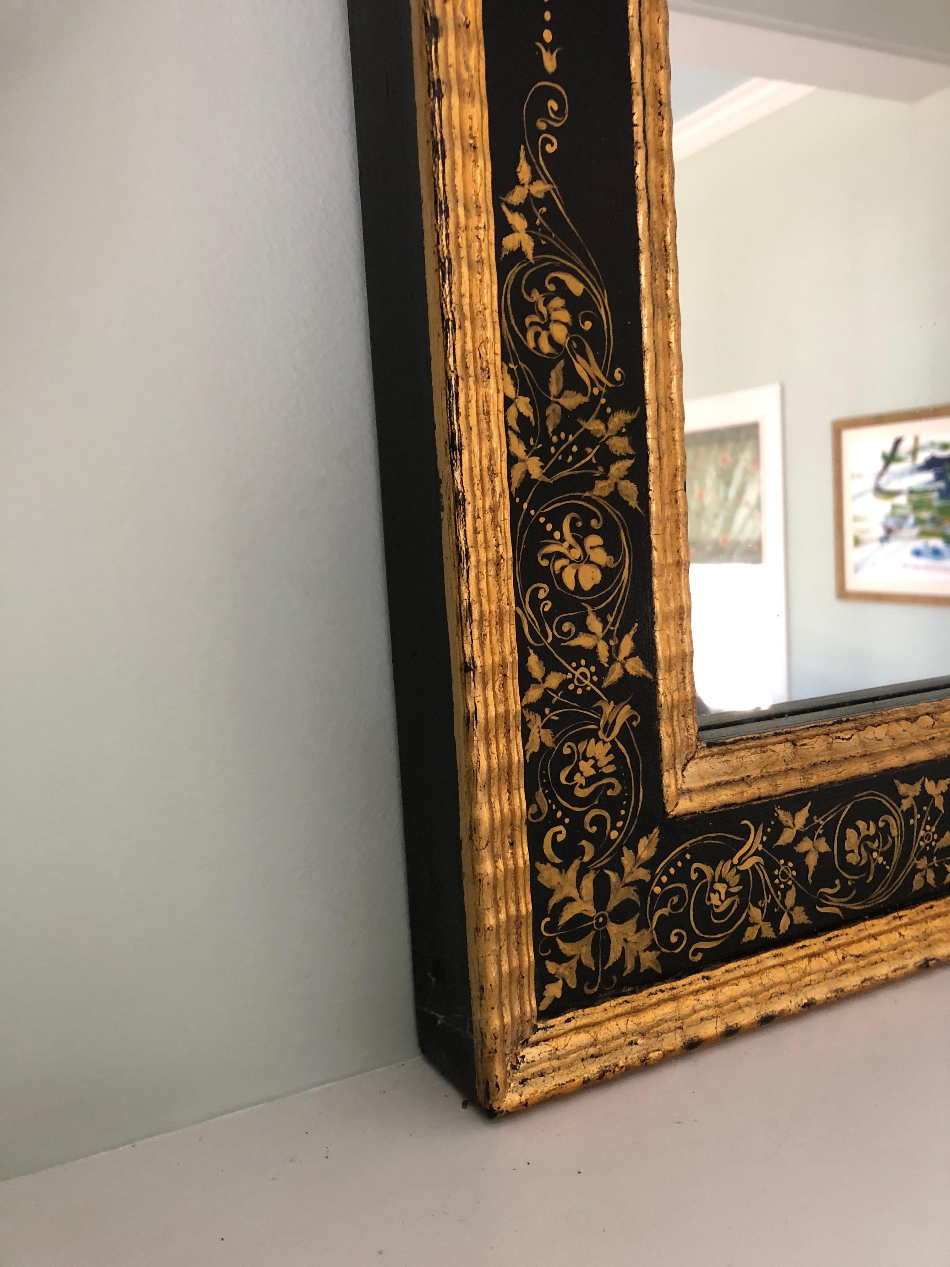 large black and gold mirror