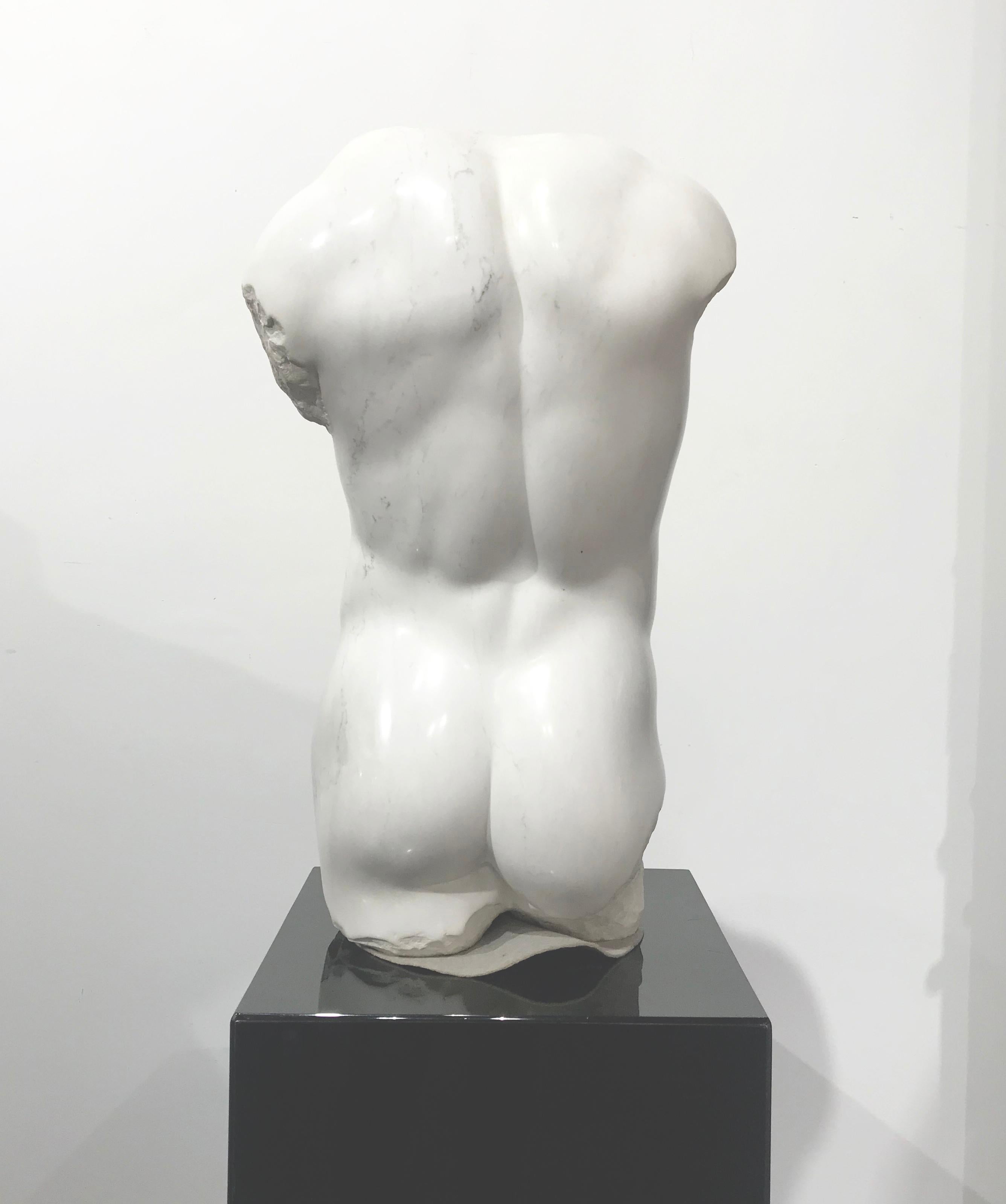 Fabulous large Sculptured Marble of a Nude Male Torso is a one-of-a-kind, carved in solid Vermont marble directly out of a geometric block; the eye level views the majestic Torso all around without any obstruction, with the aid of natural light.