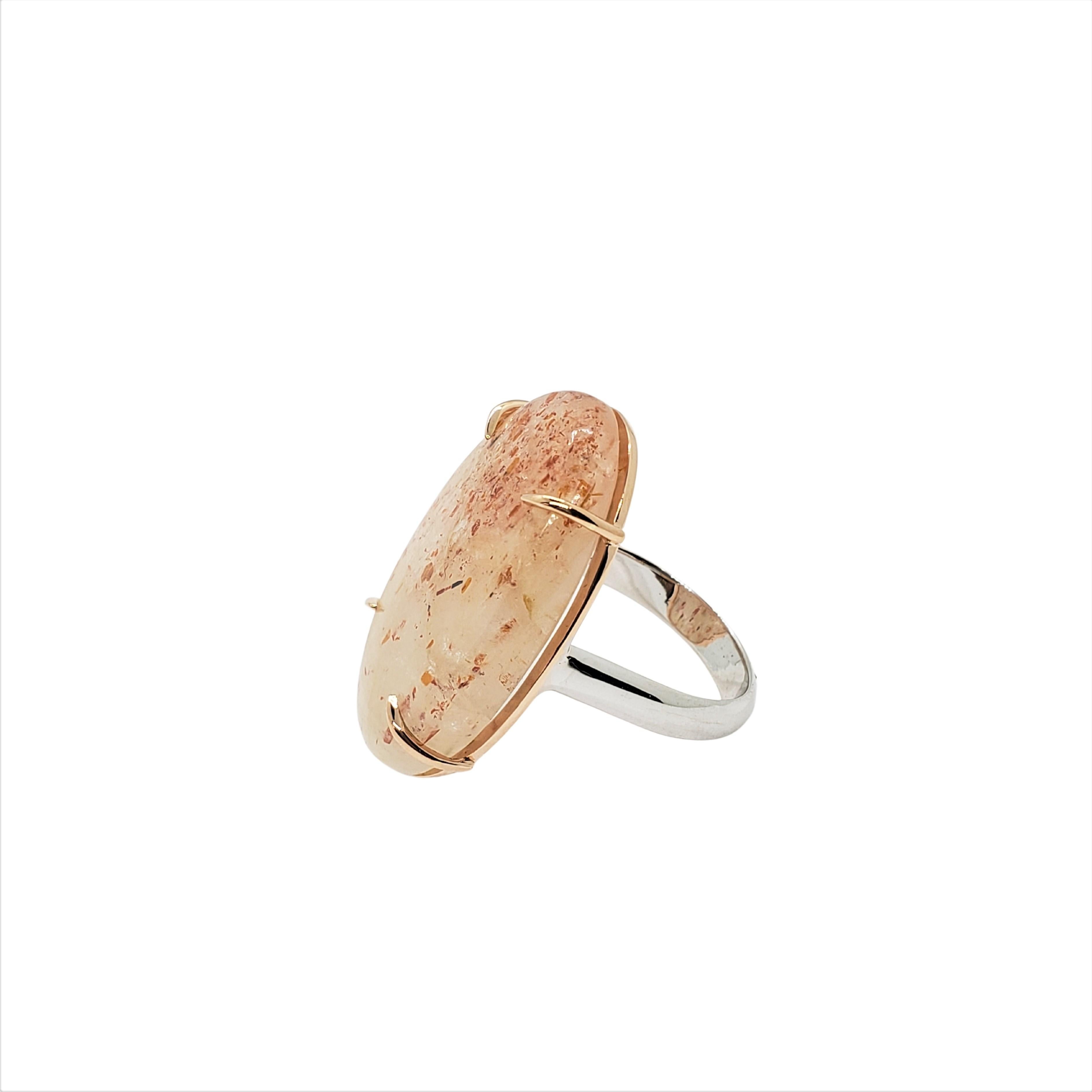 Contemporary Magnificent Large Oval Sunstone Bold Statement Ring in 14K Pink and White Gold For Sale