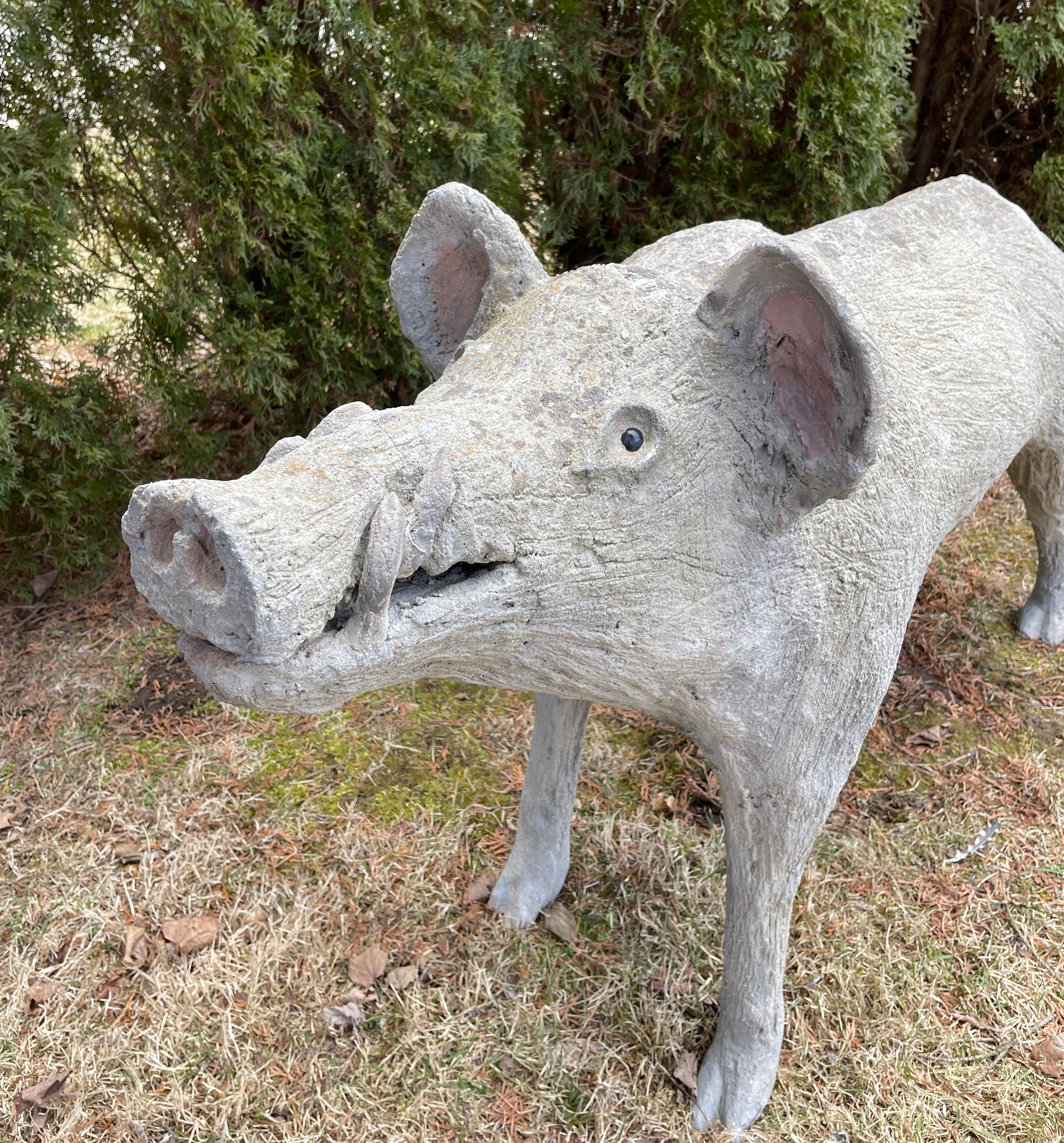 concrete razorback statue